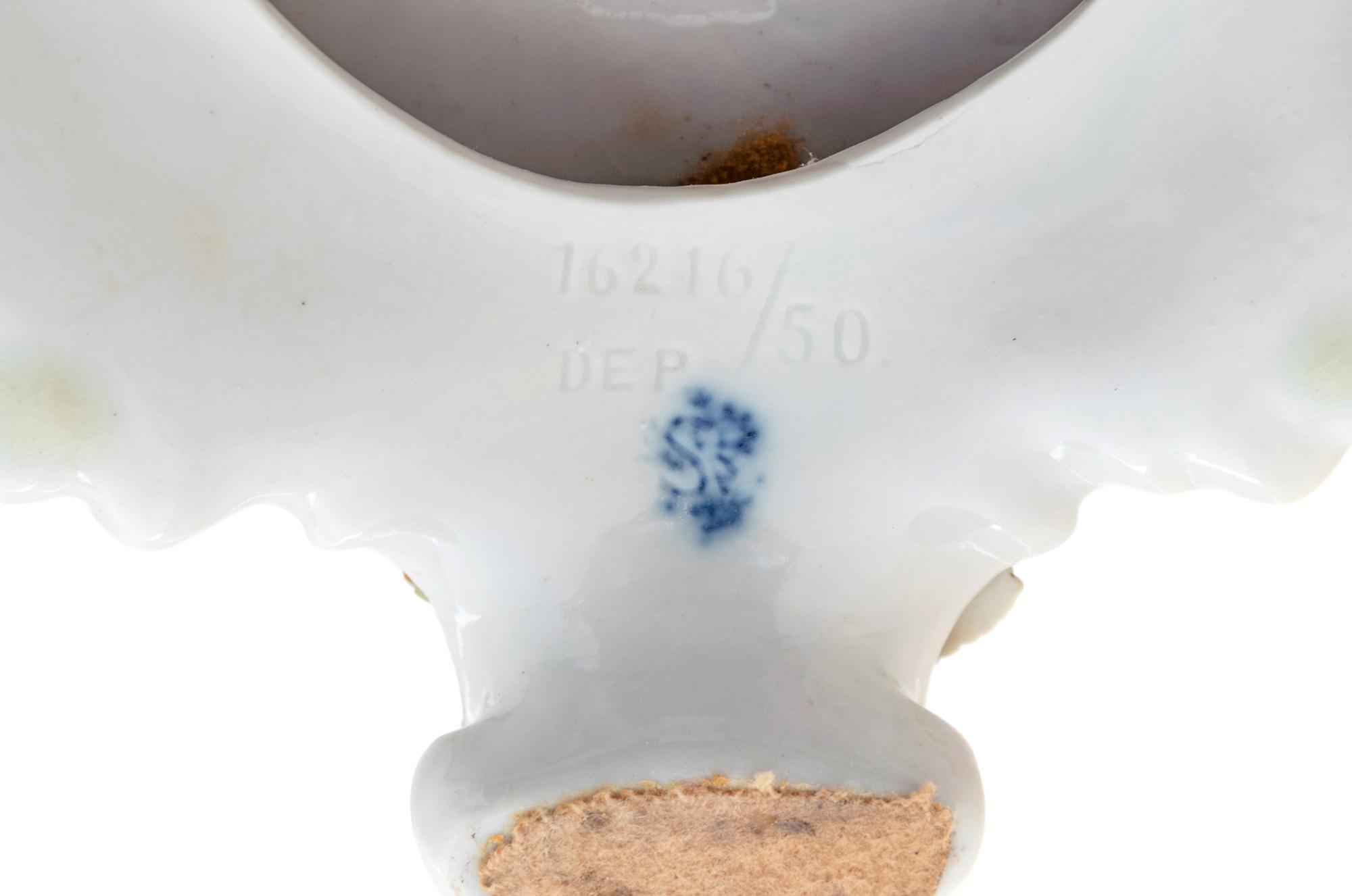 A Pair of German Porcelain Urns