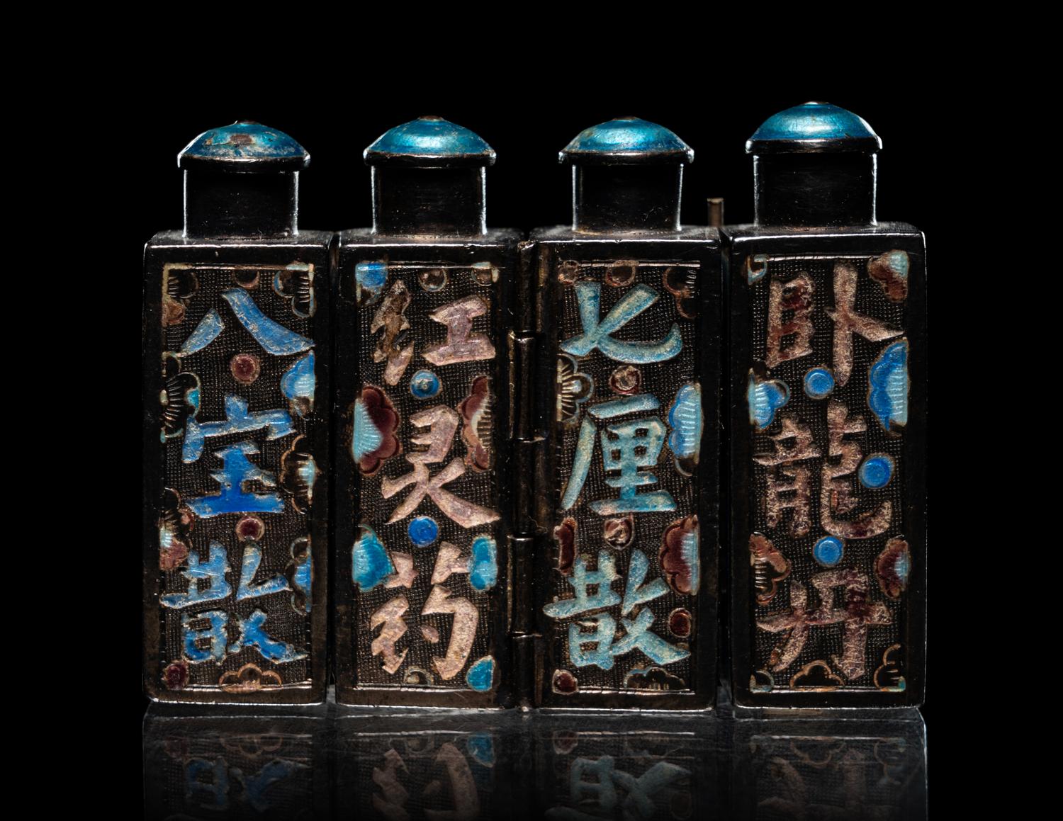 Four Metal Bottles
