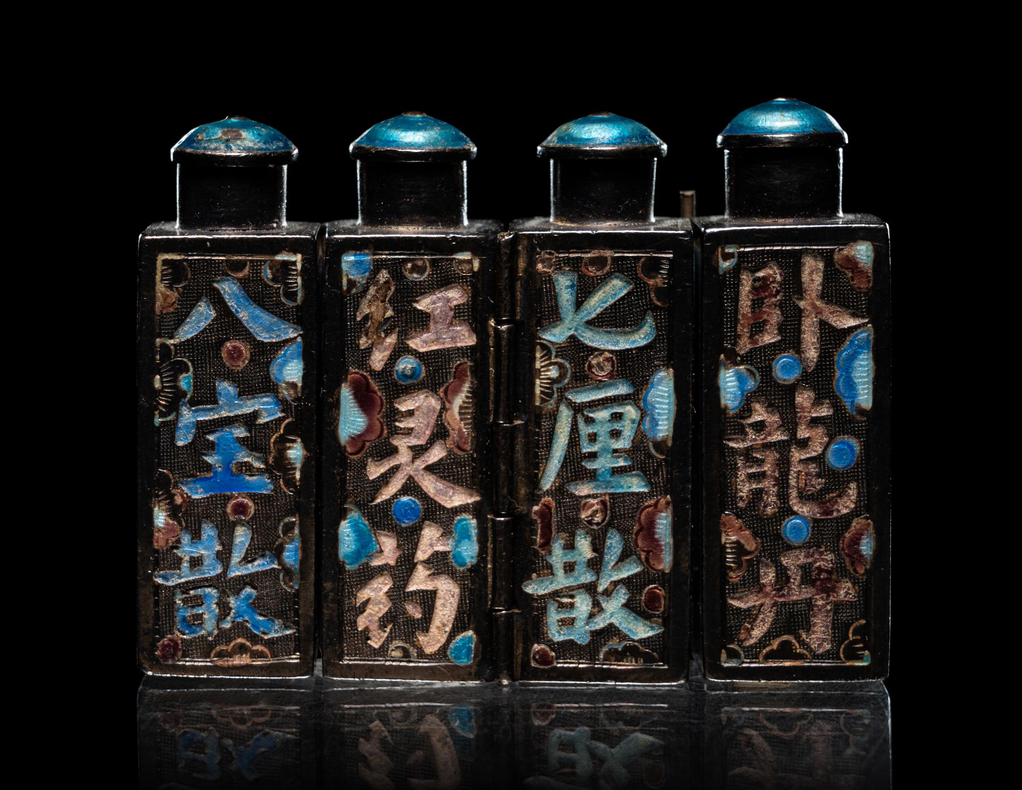 Four Metal Bottles