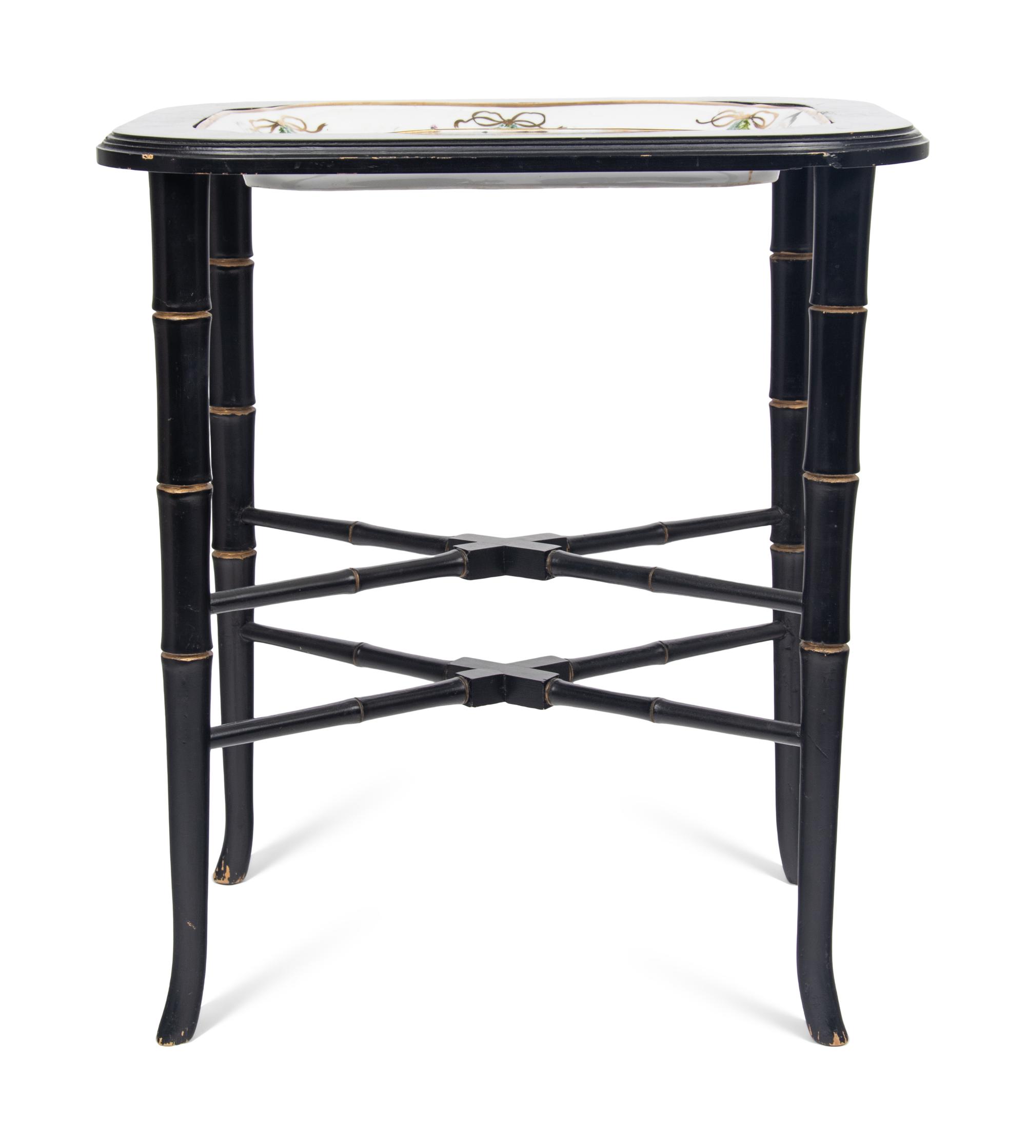 A German Porcelain Tray Set in a Later Ebonized Side Table