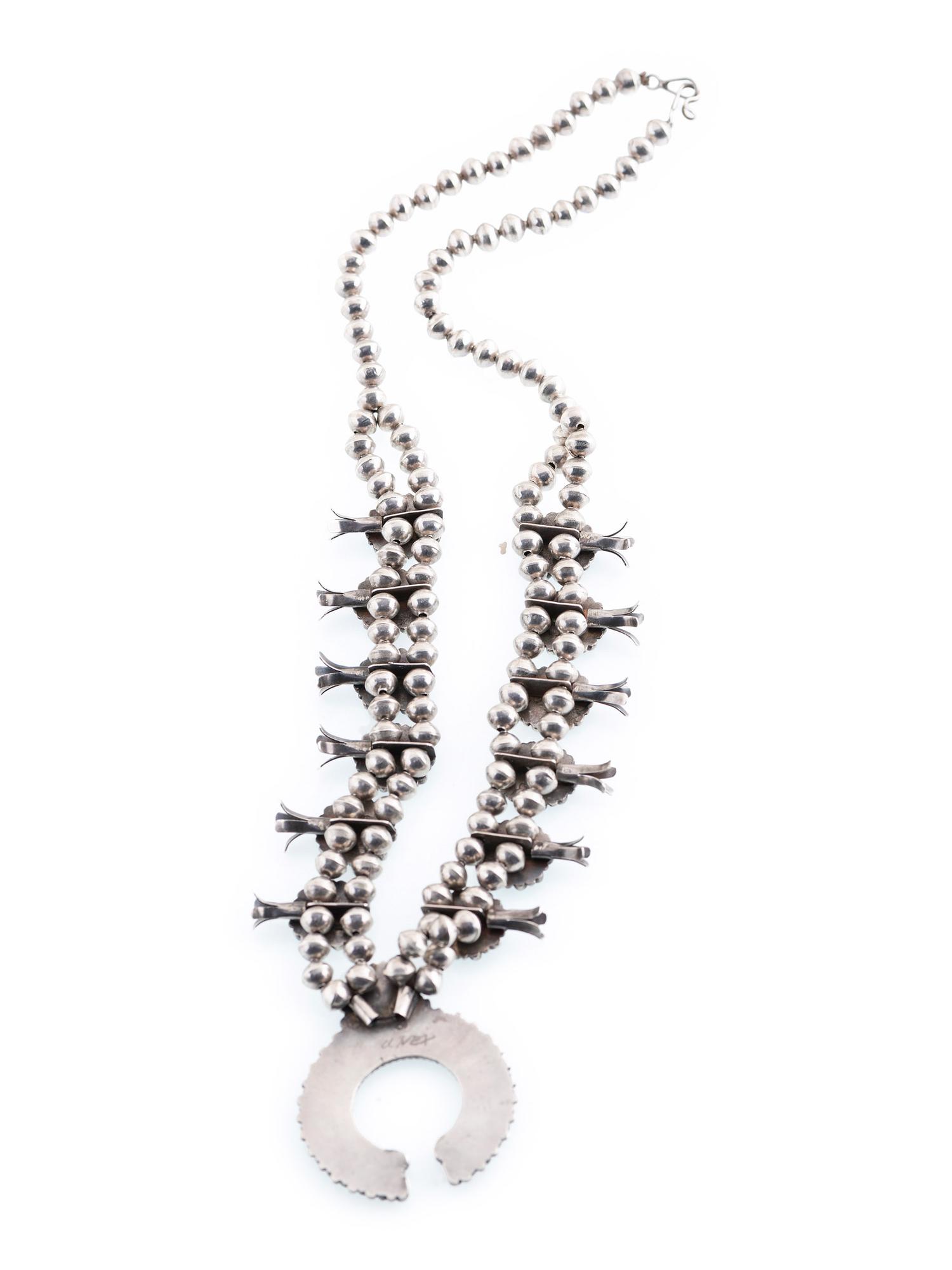 A Zuni Petit Point Turquoise Squash Bloom Necklace