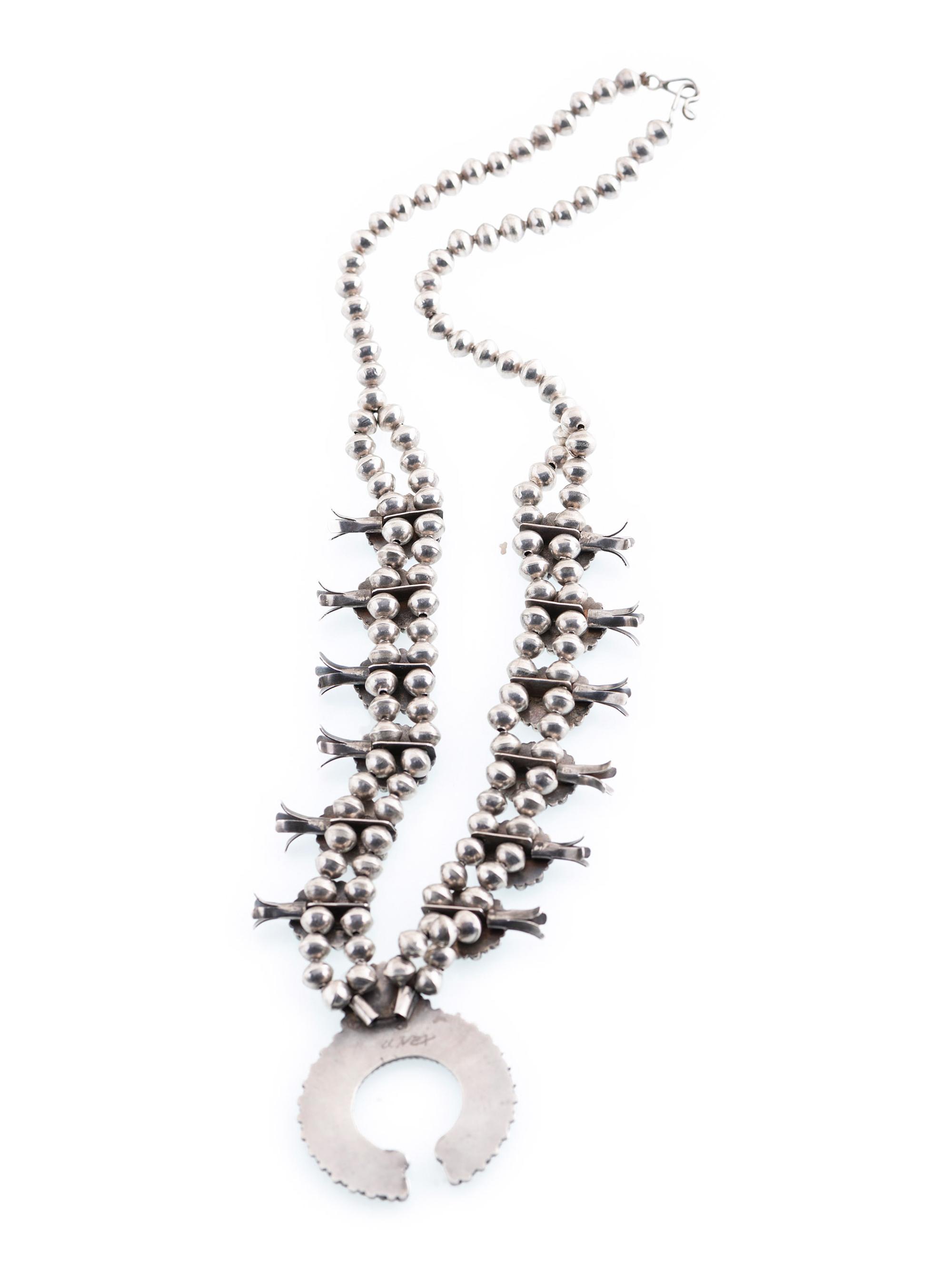A Zuni Petit Point Turquoise Squash Bloom Necklace