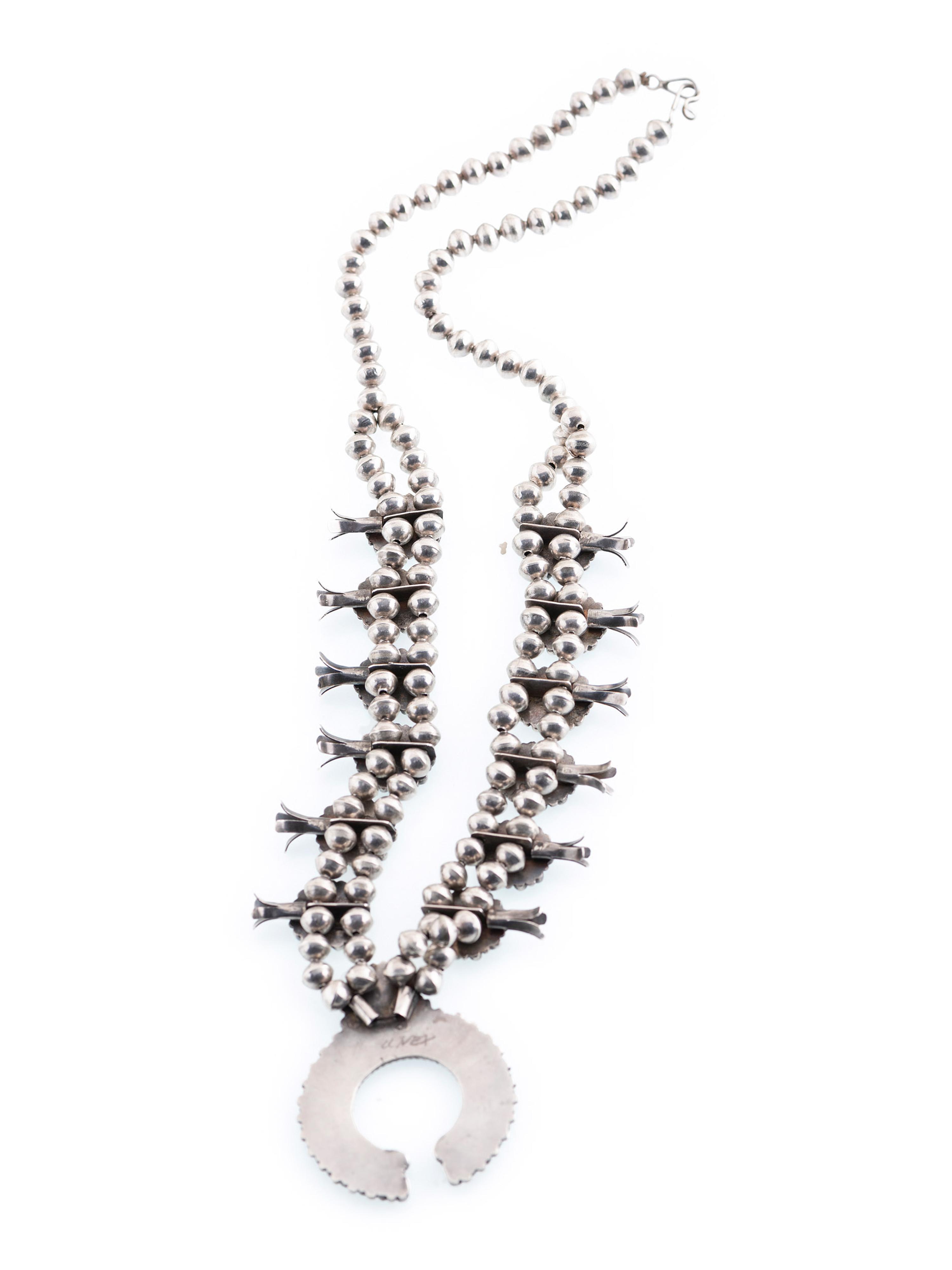 A Zuni Petit Point Turquoise Squash Bloom Necklace