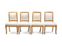 A Set of Four Charles X Amaranth-Inlaid Satinwood Dining Chairs