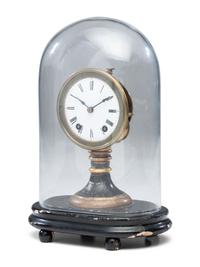 An Ebonized and Parcel Gilt Mantel Clock