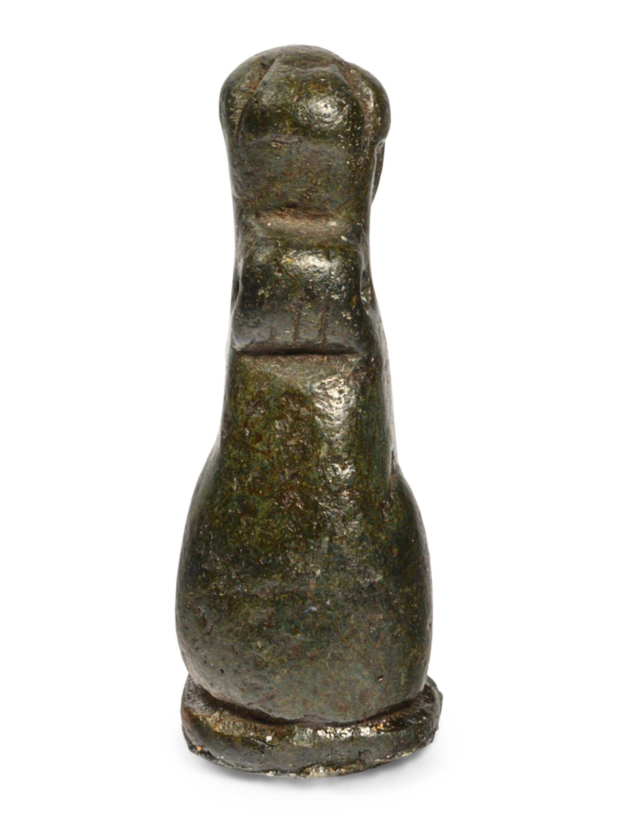 An Egyptian Bronze Sphinx