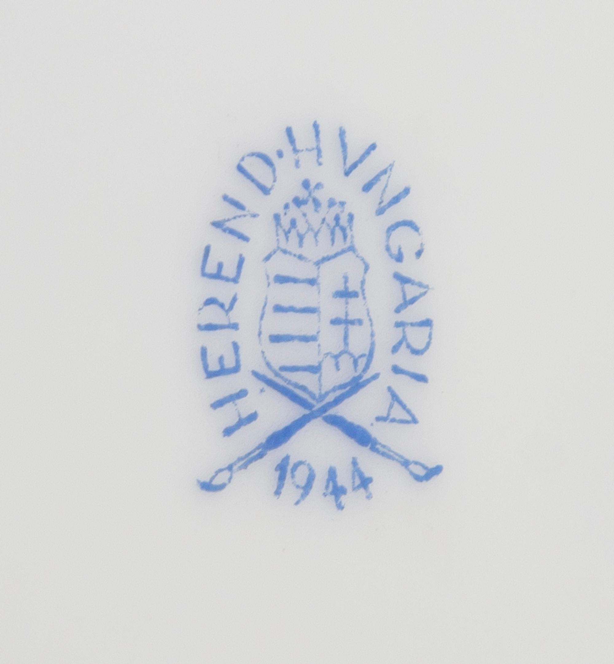 An Assembled Herend Porcelain Dinner Service for Twelve, Diameter of dinner plate 10 3/8 inches.