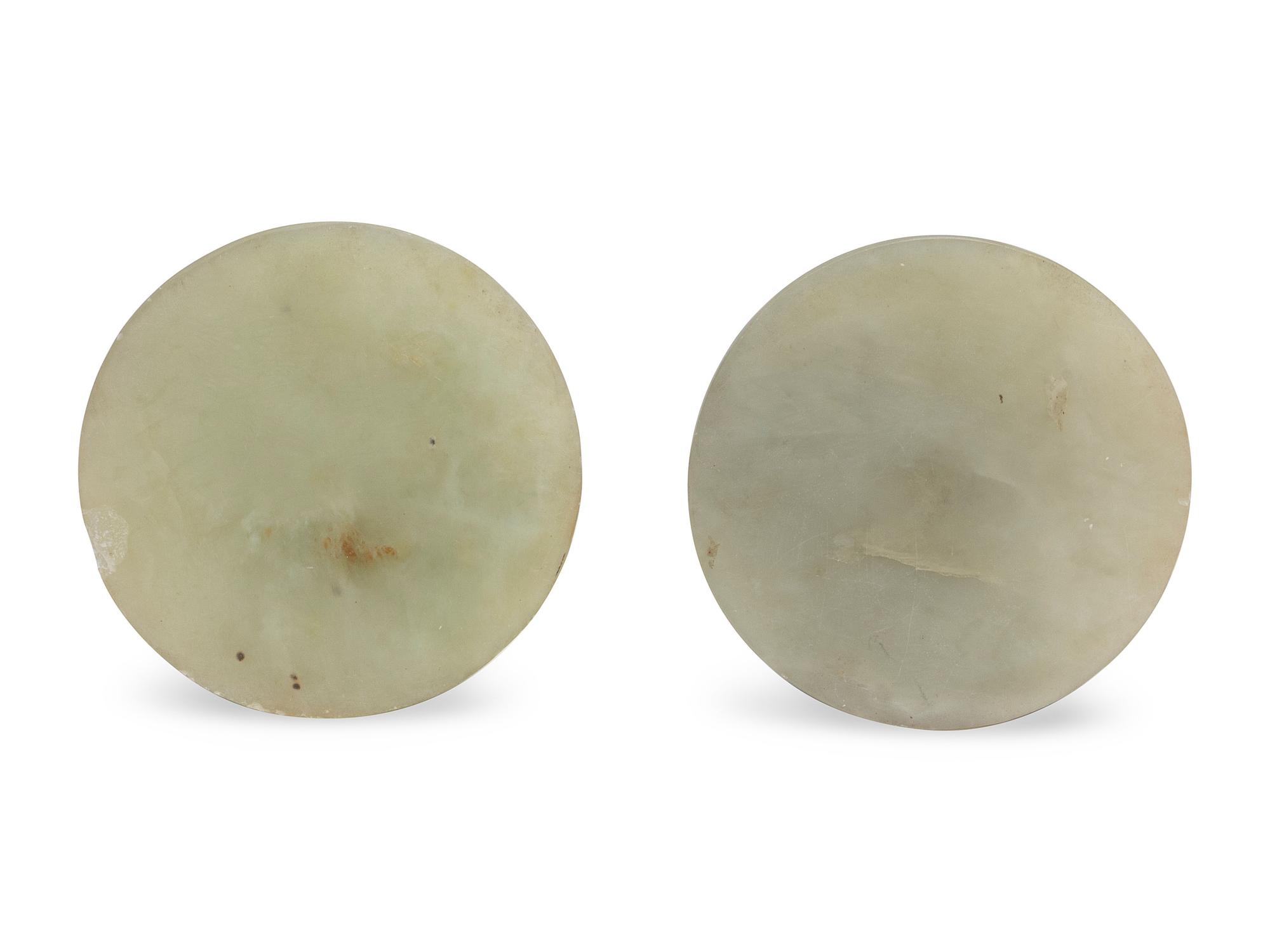 A Pair of Chinese Carved Nephrite Candlesticks