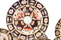 A Royal Crown Derby Imari Porcelain Dinner Service
