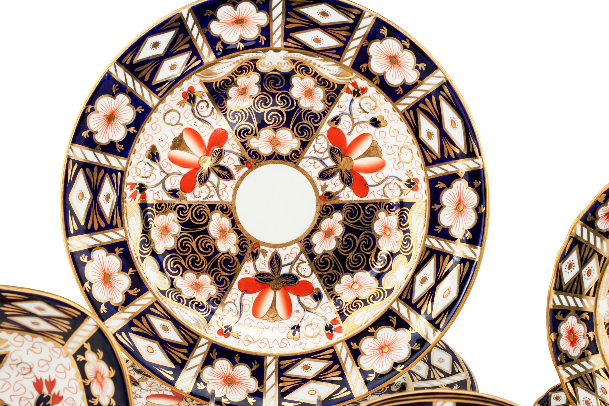 A Royal Crown Derby Imari Porcelain Dinner Service