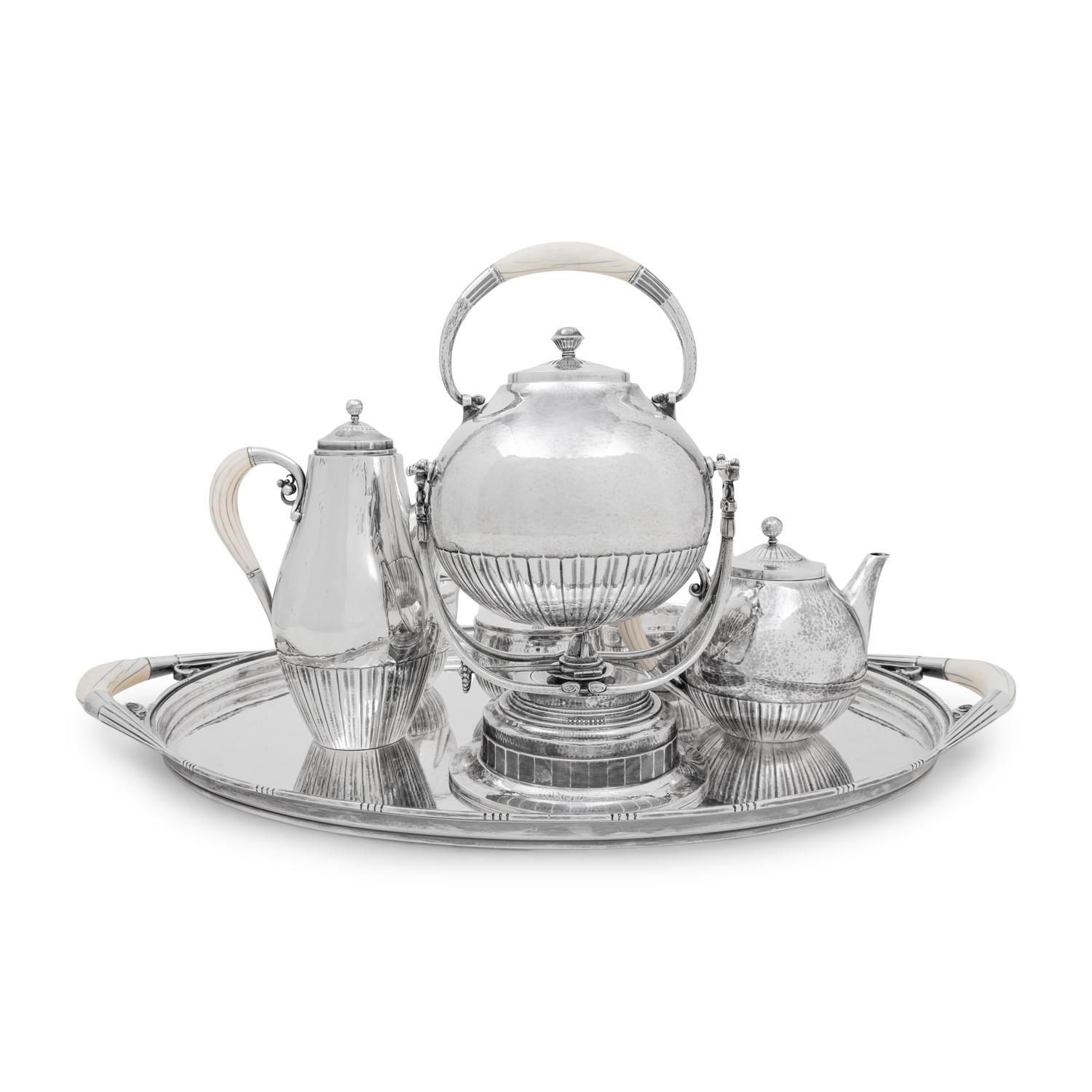 A Georg Jensen Cosmos Seven-Piece Silver Tea and Coffee Service