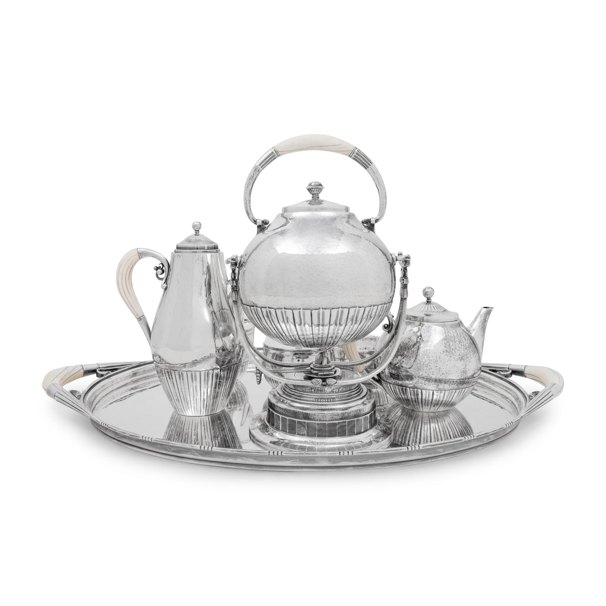 A Georg Jensen Cosmos Seven-Piece Silver Tea and Coffee Service