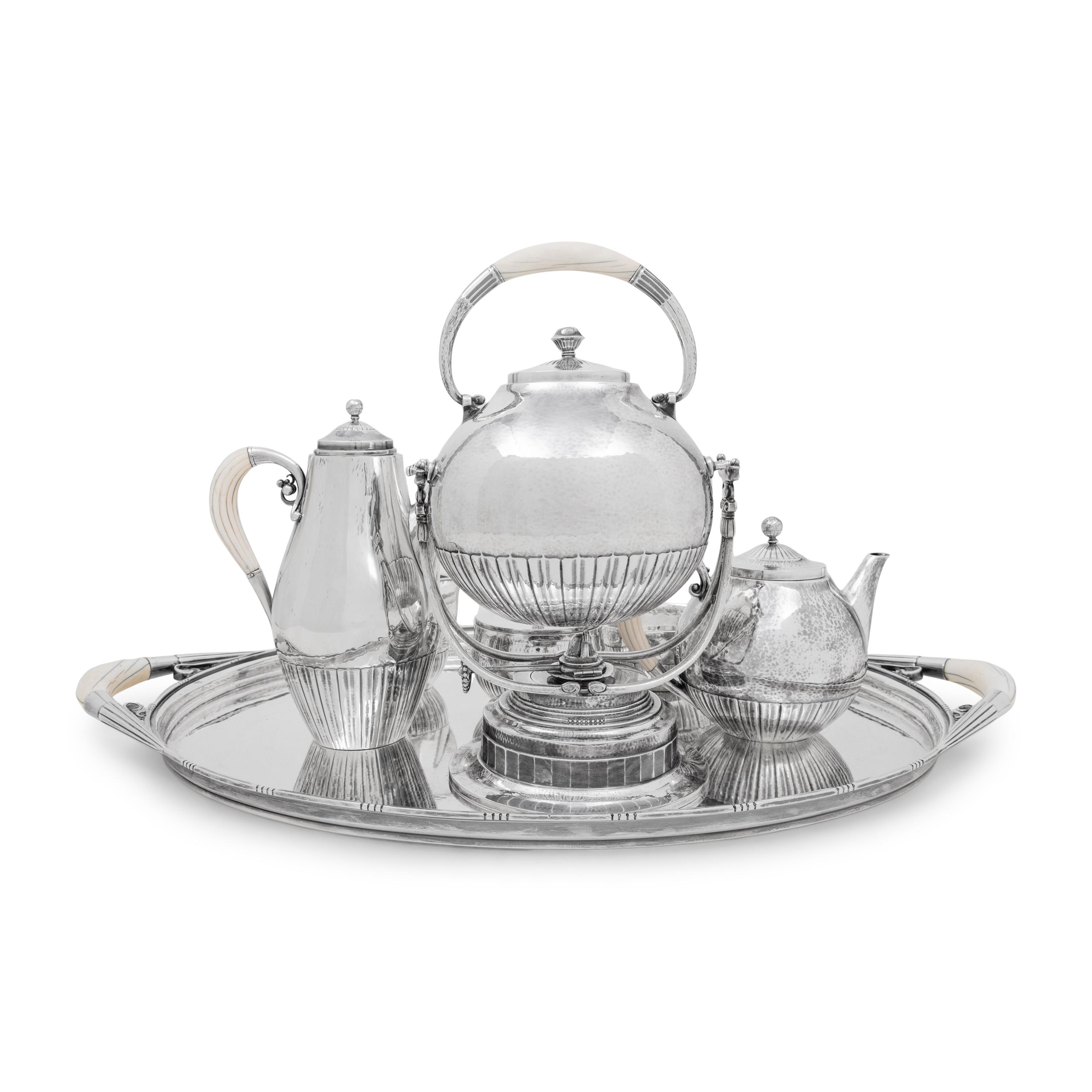 A Georg Jensen Cosmos Seven-Piece Silver Tea and Coffee Service