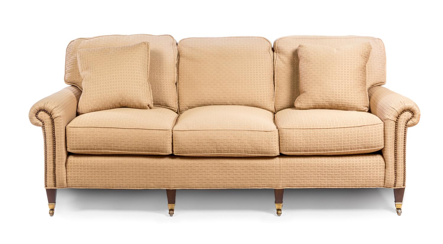 An Upholstered Three-Seat Sofa Height 31 x width 80 x depth 37 1/2 inches.