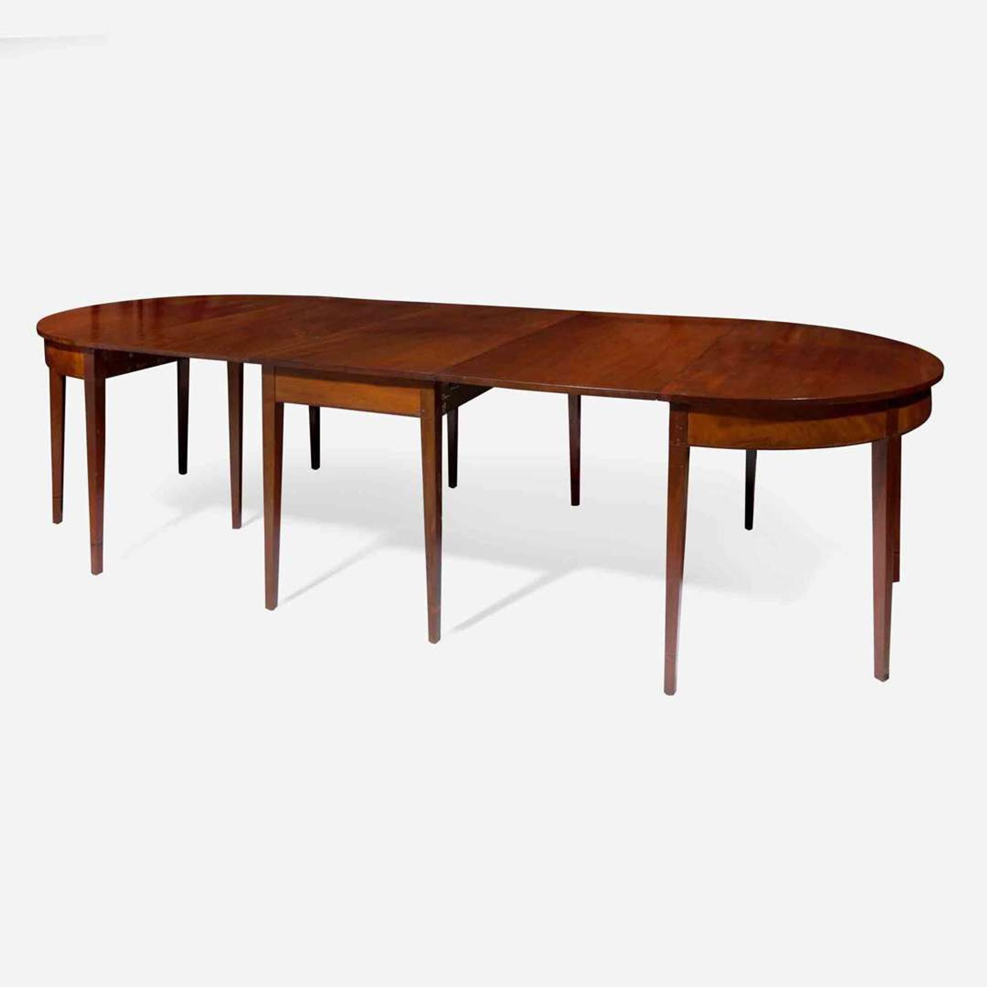 A Federal three-part inlaid mahogany dining table circa 1800