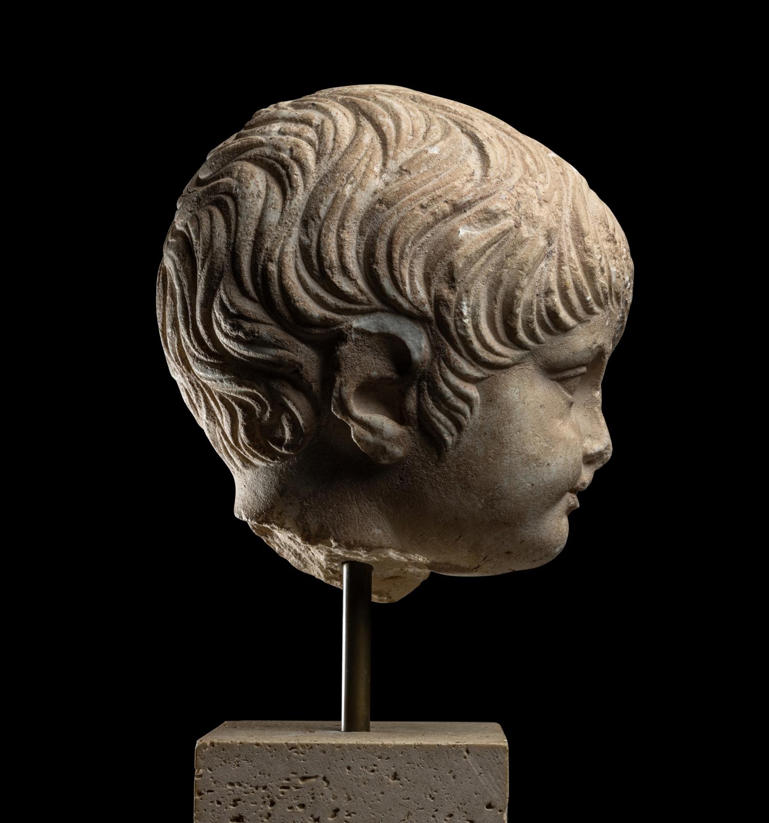 A Roman Marble Portrait Head of a Boy