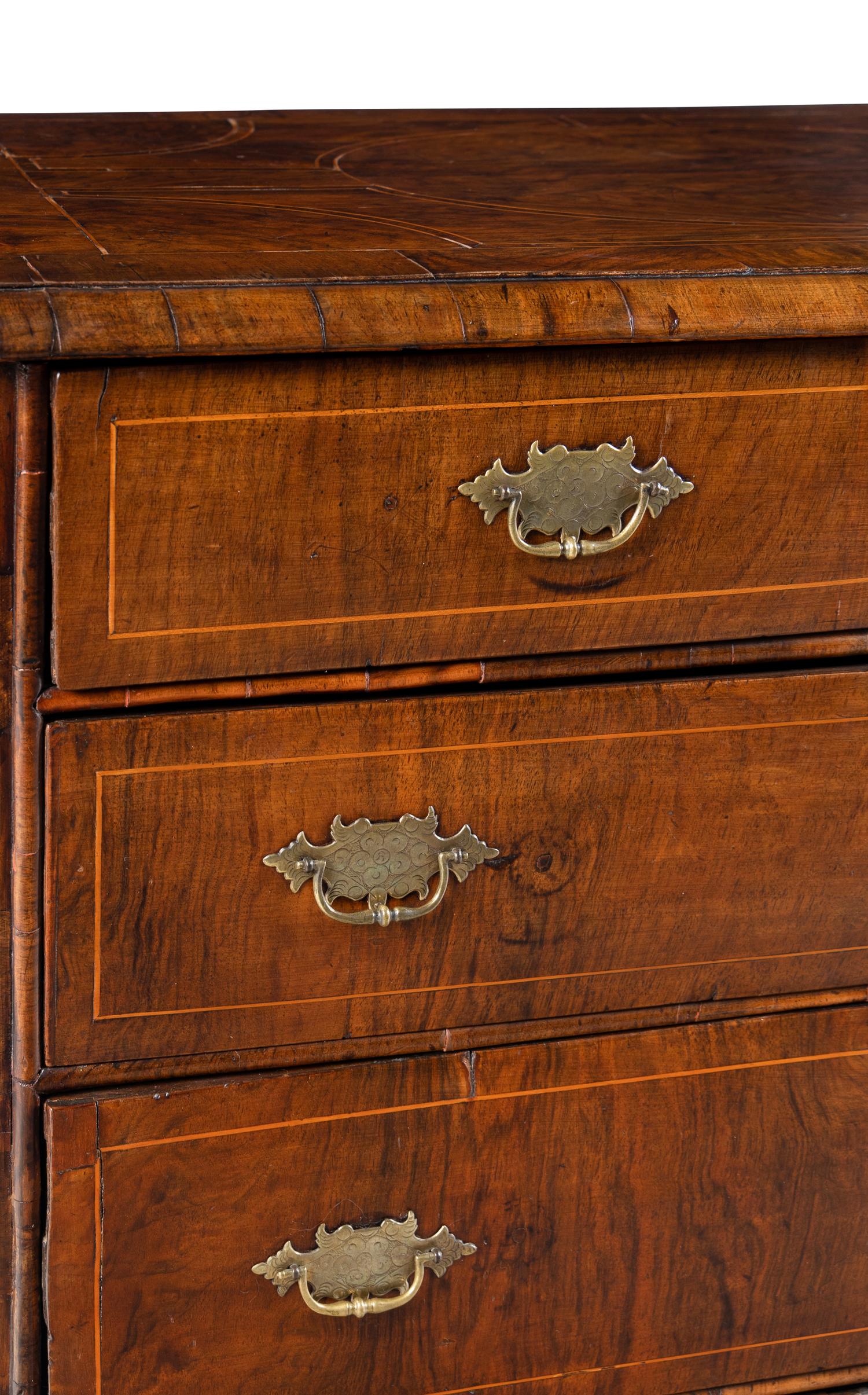 A George II Satinwood-Inlaid Walnut Chest of Drawers