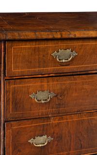 A George II Satinwood-Inlaid Walnut Chest of Drawers