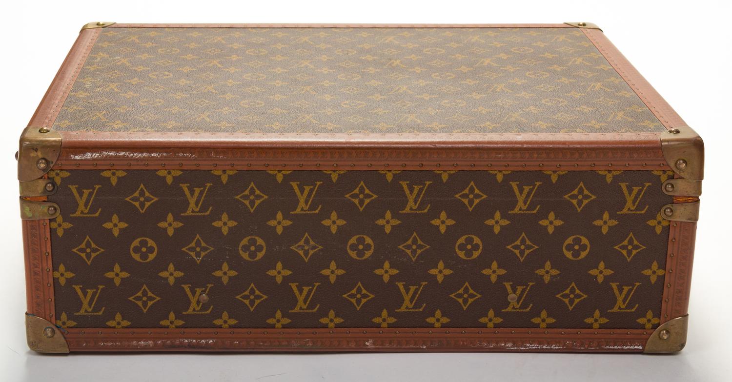 A Louis Vuitton Monogram Canvas Bisten Suitcase, 14"H x 19"W x 6.5"D; Handle drop: 2".