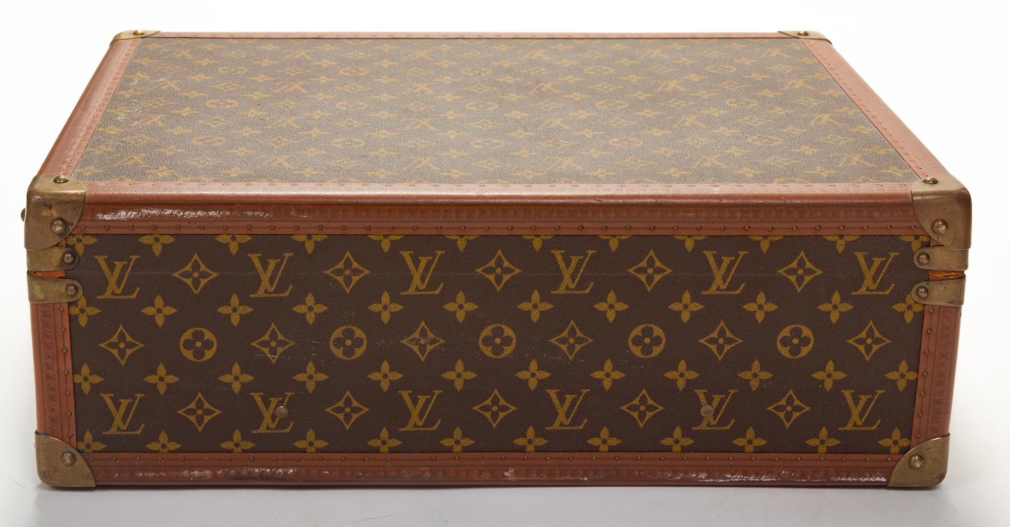 A Louis Vuitton Monogram Canvas Bisten Suitcase, 14"H x 19"W x 6.5"D; Handle drop: 2".