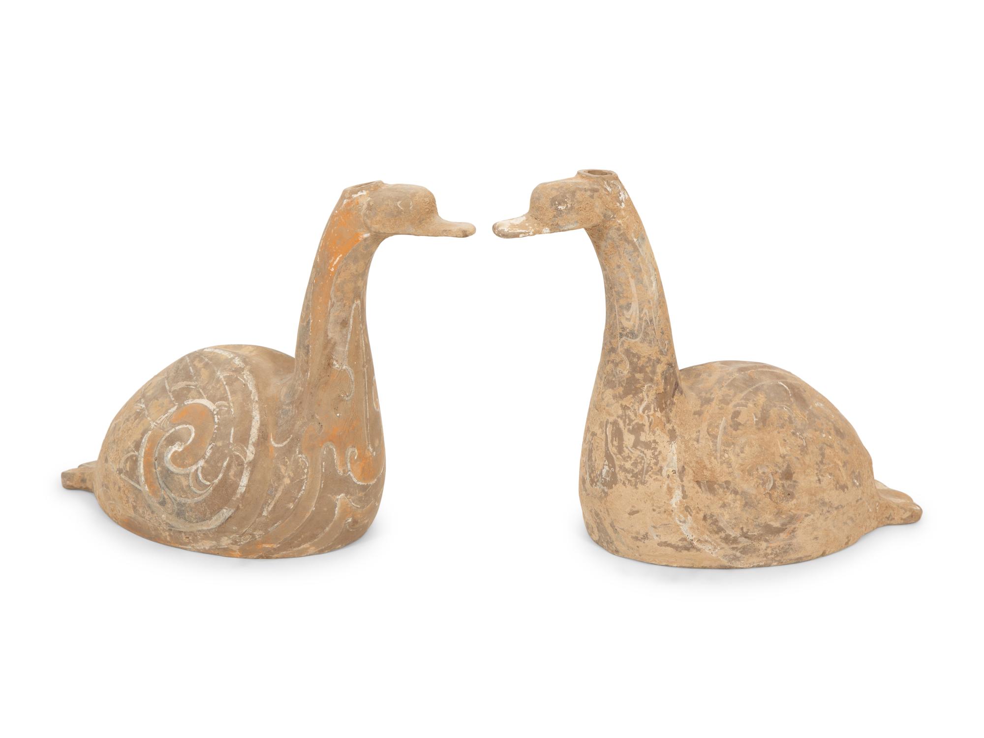 A Pair of Han Style Pottery Ducks