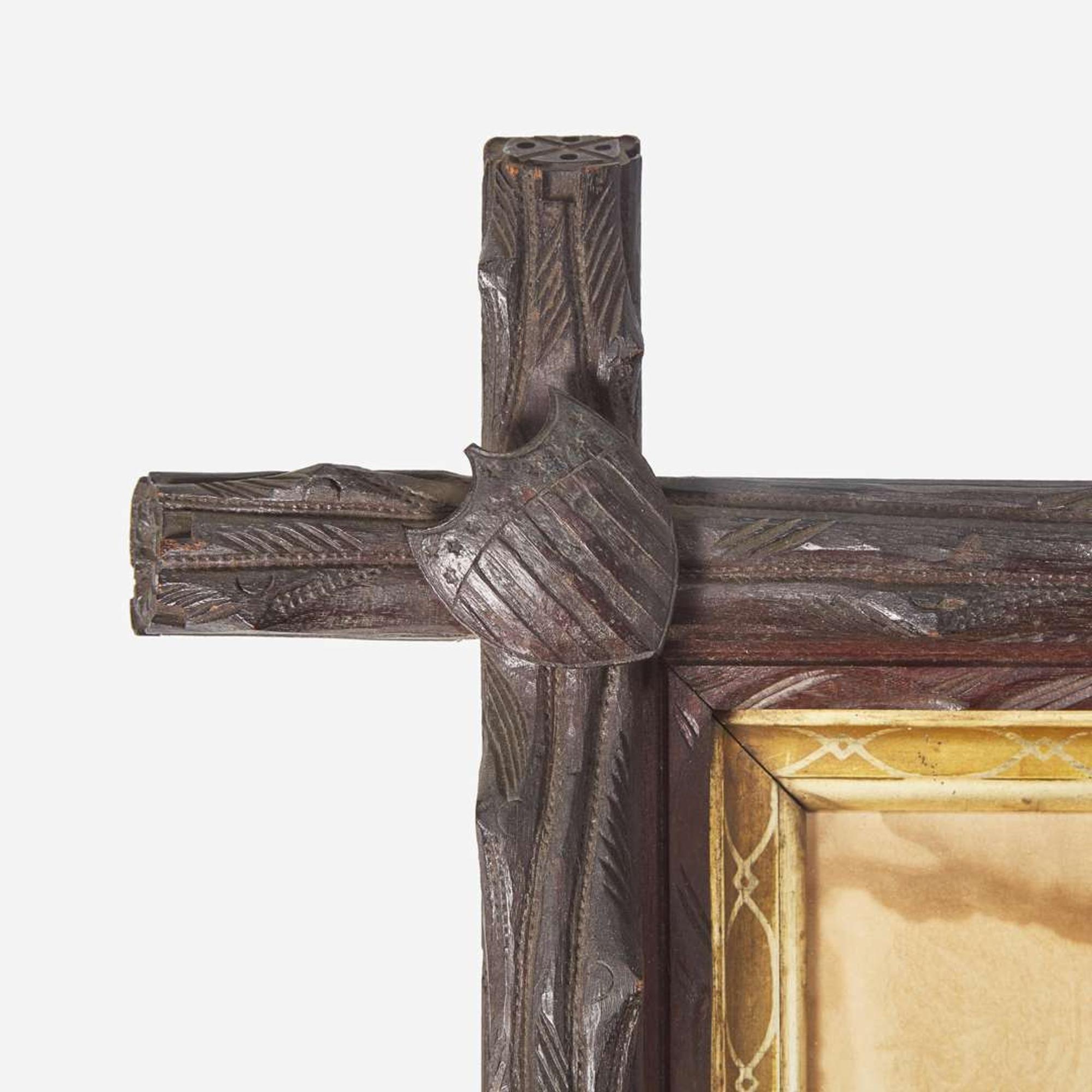 [CIVIL WAR]. Folk-art carved frame with discharge for Massachusetts soldier Charles Clark, ca 1865.