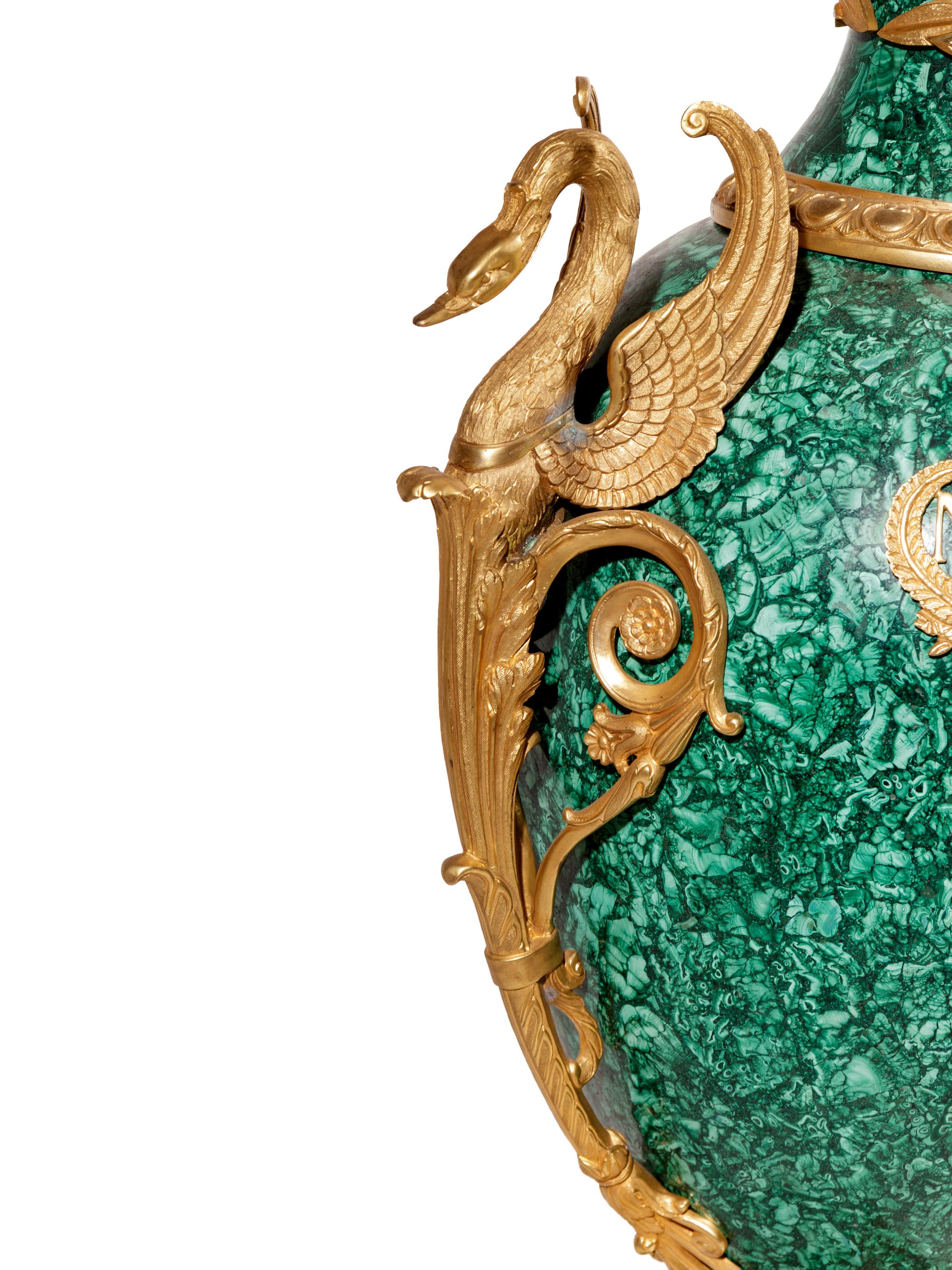 A Pair of Empire Style Gilt Bronze Mounted Malachite Veneered Urns