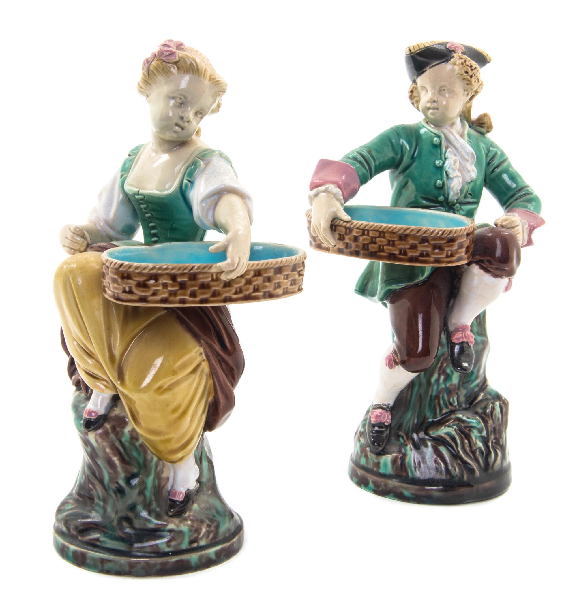 A Pair of Minton Majolica Figures, Height 7 1/2 inches.