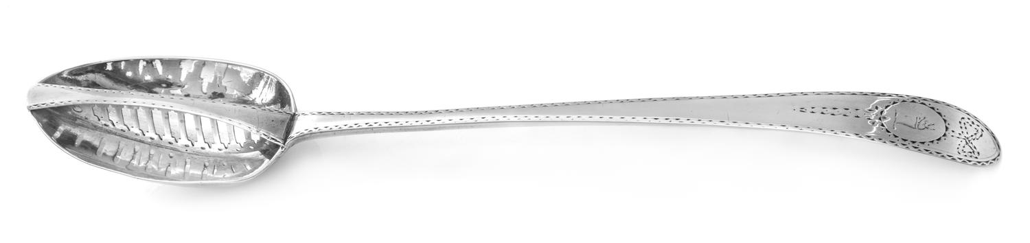 An Irish George III Silver Straining Spoon, Michael Keating I, Dublin, 1781, the Old English handle with a bright-cut wrigglework borde