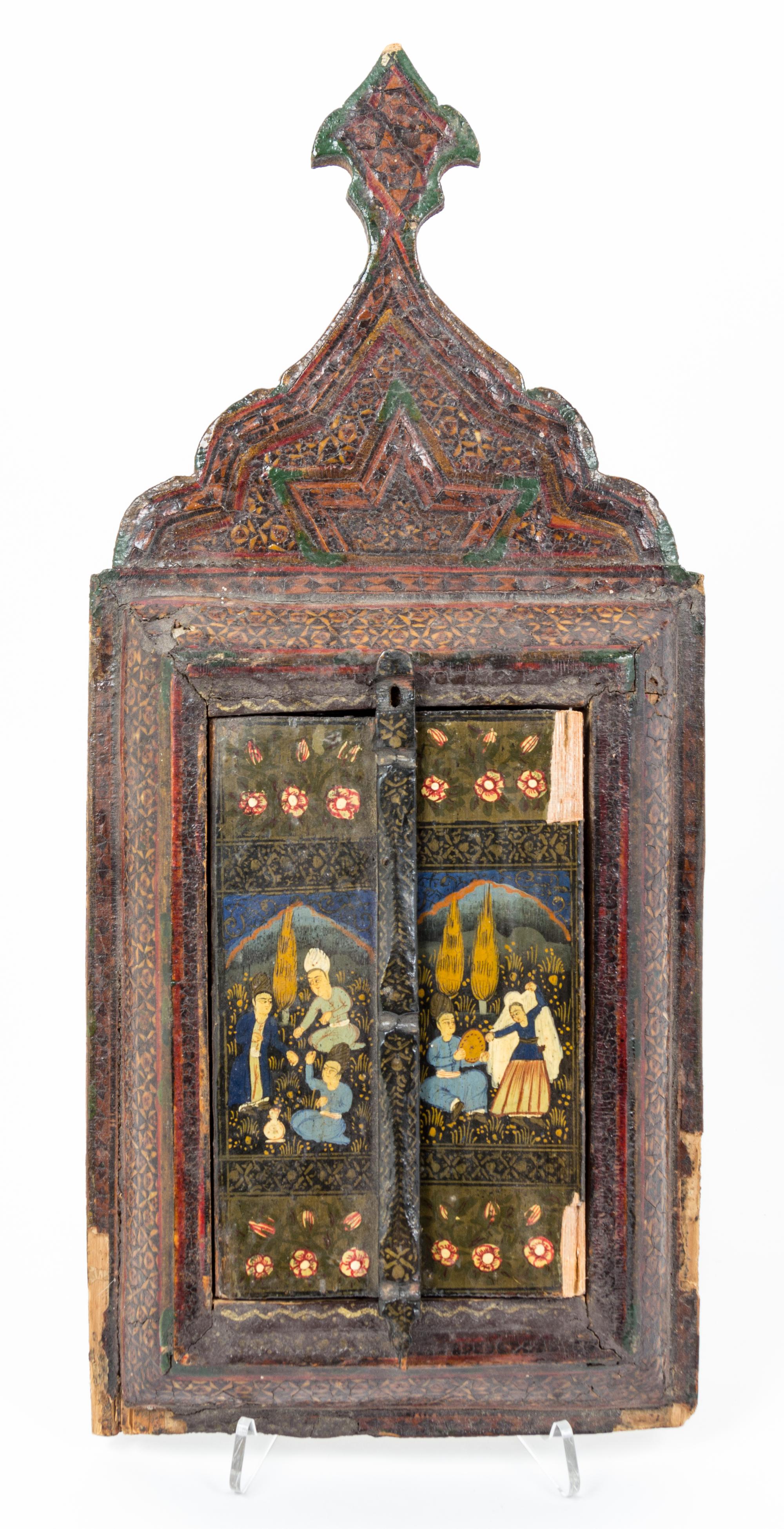 A Persian Polychrome Wedding Mirror Height 19 3/4 inches.