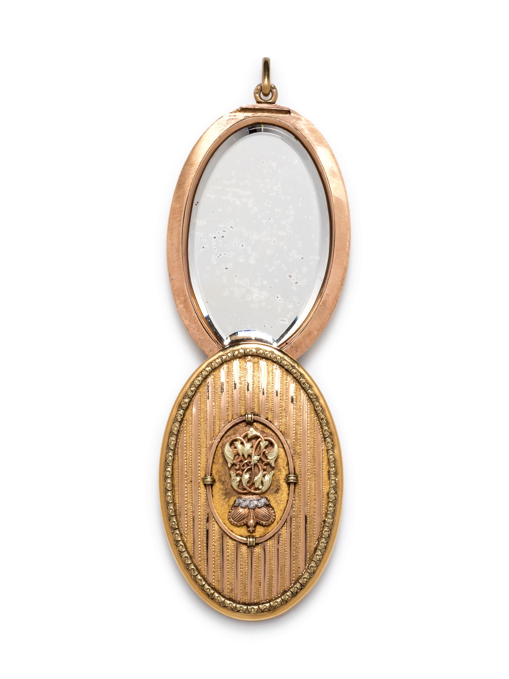An Art Nouveau 14 Karat Bicolor Gold Mirrored Locket/Pendant, Henrik Wigstrom,