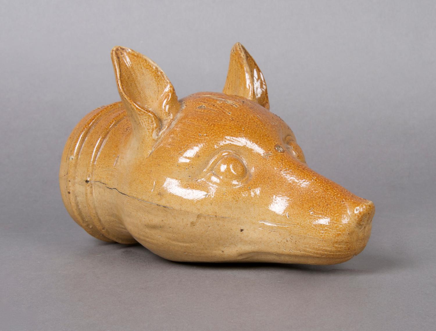 An English Earthenware Stirrup Vessel, Length 6 3/4 inches.