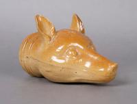 An English Earthenware Stirrup Vessel, Length 6 3/4 inches.