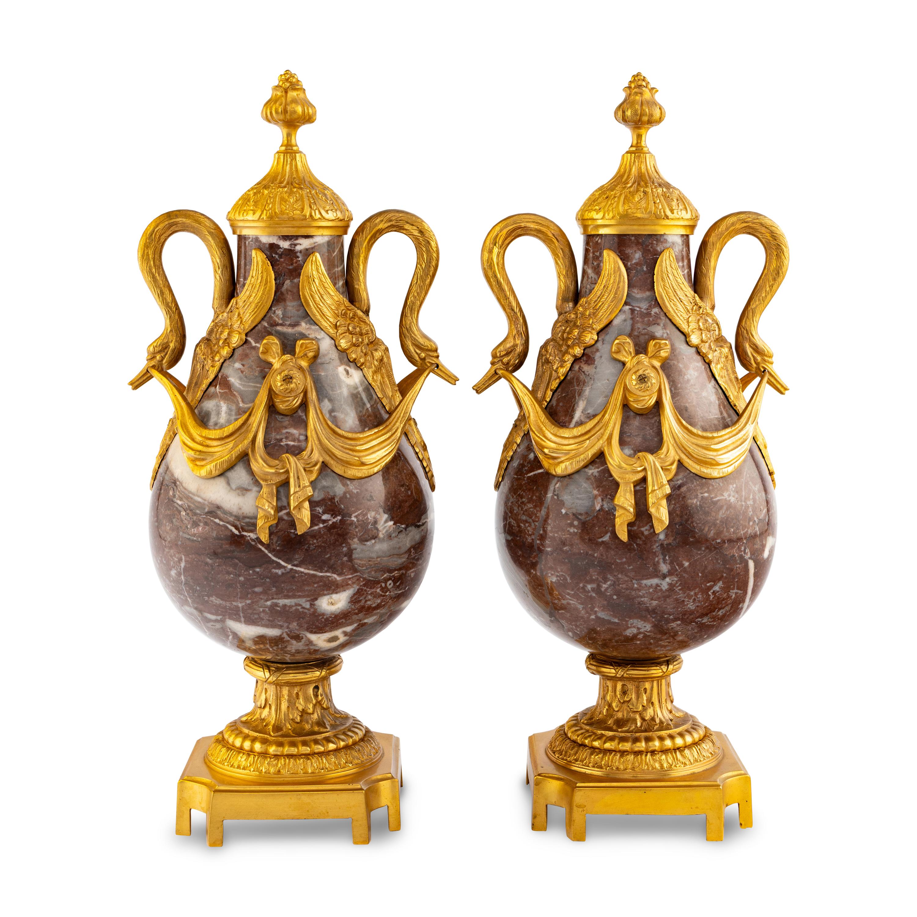 A Pair of Louis XVI Style Gilt Bronze Mounted Marble Urns