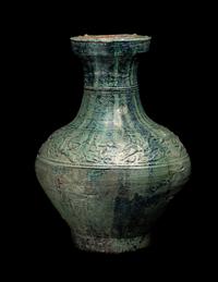 A Chinese Molded Green Glazed Pottery Hu Vase