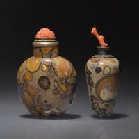 Two Chinese Puddingstone Snuff Bottles, Qing Dynasty, Circa 1750-1860 — 1750-1860年 抱子石鼻煙壺兩支