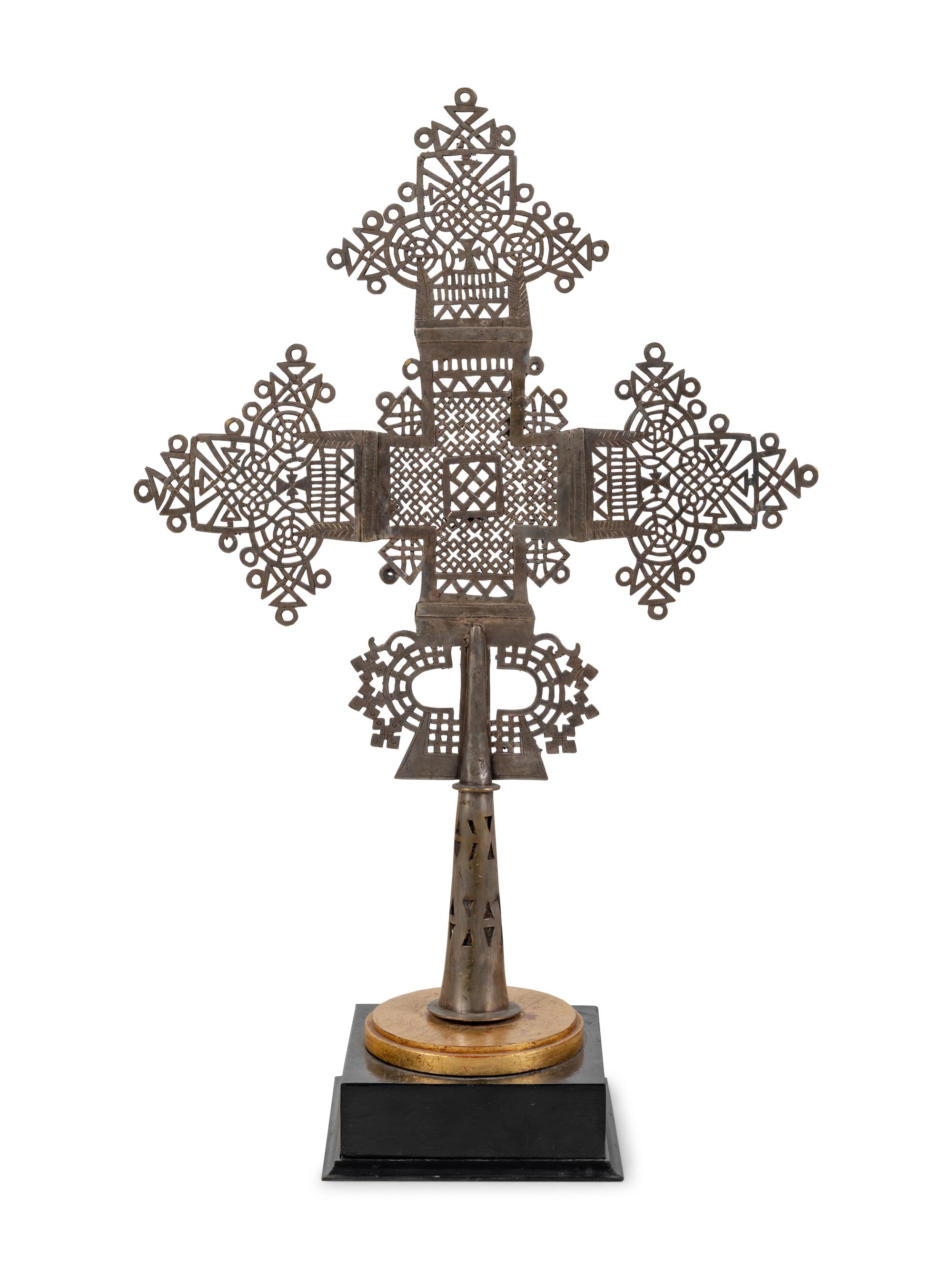 A Coptic Silvered Metal Processional Cross on Stand
