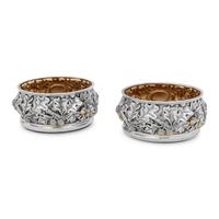 A Pair of American Silver Bottle Coasters