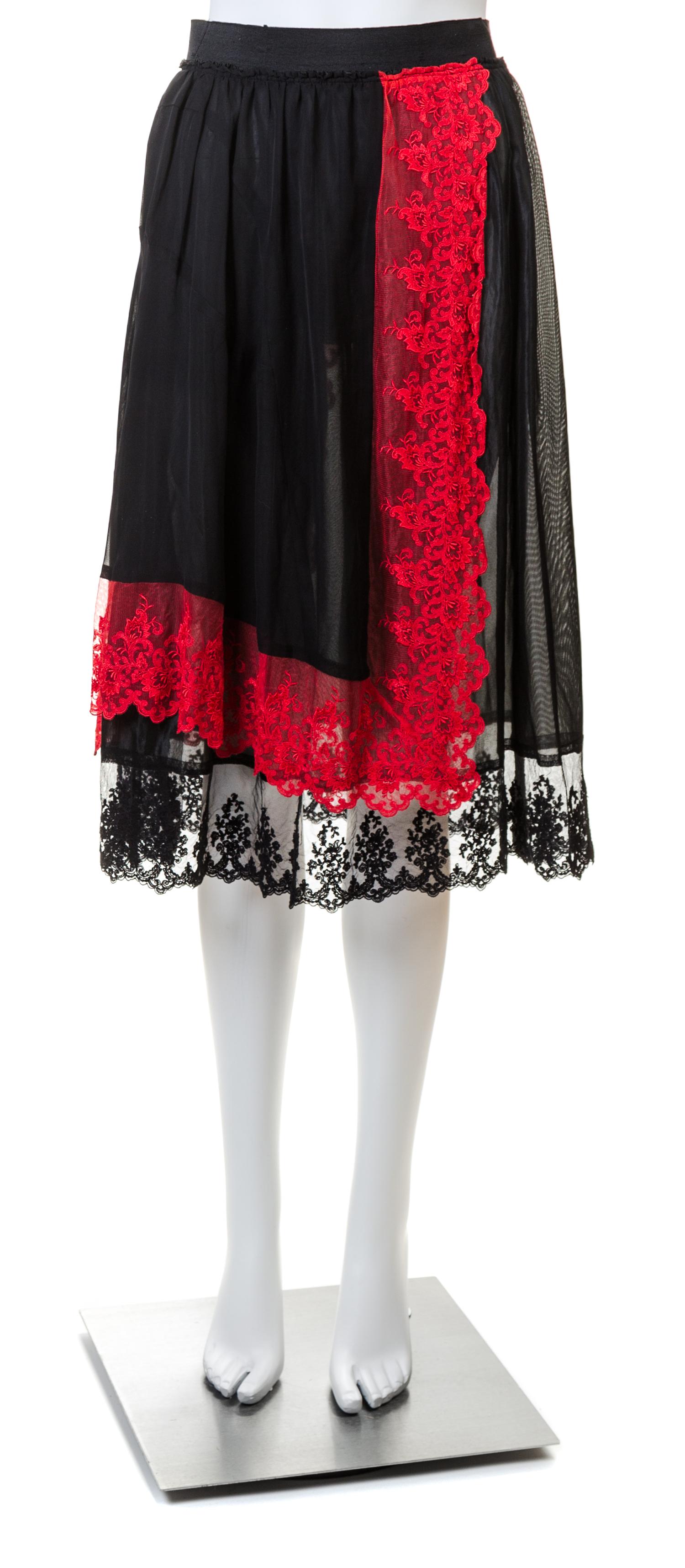 A Comme des Garcons Black Lingerie Skirt, Size small.