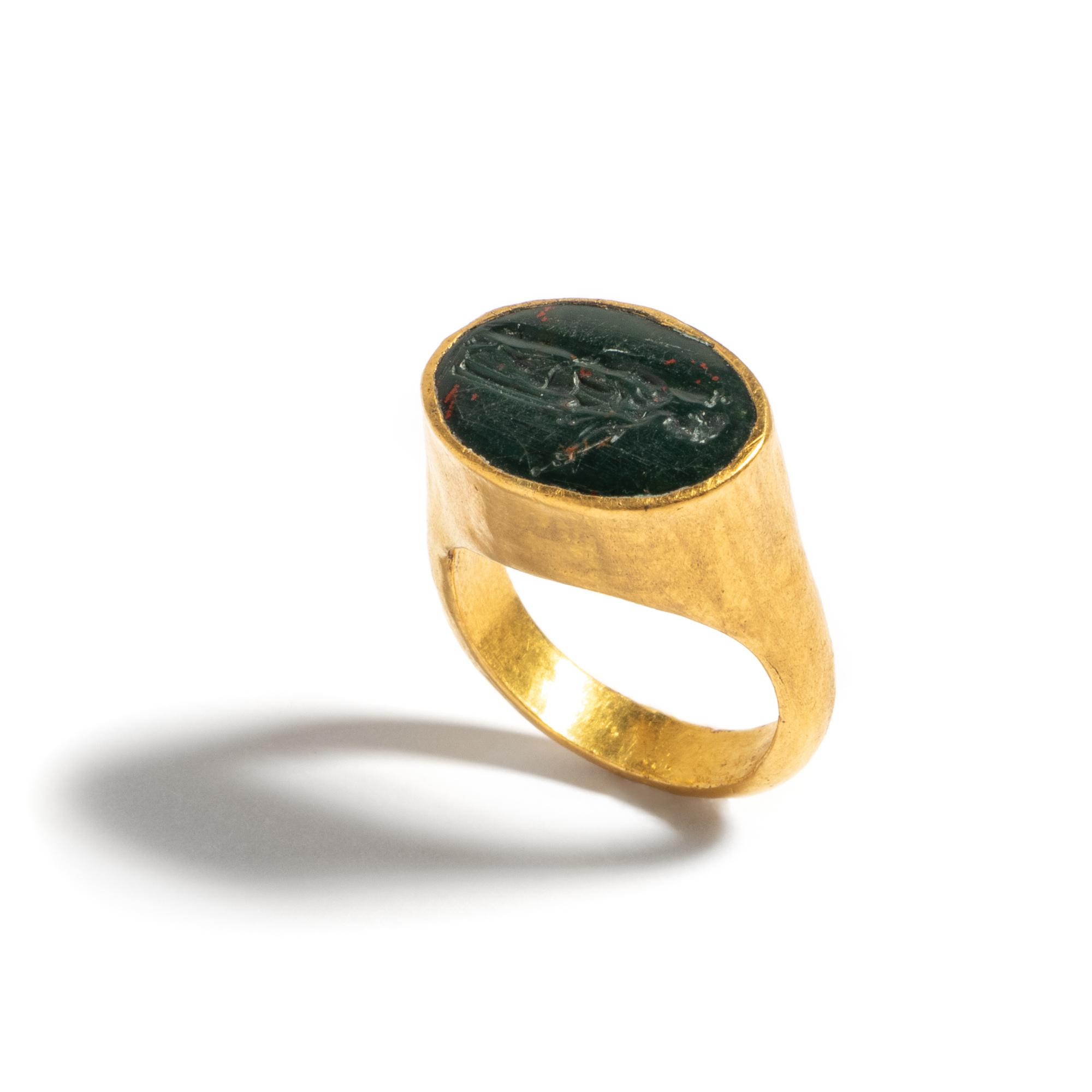 A Roman Gold and Bloodstone Finger Ring with the Goddess Diana