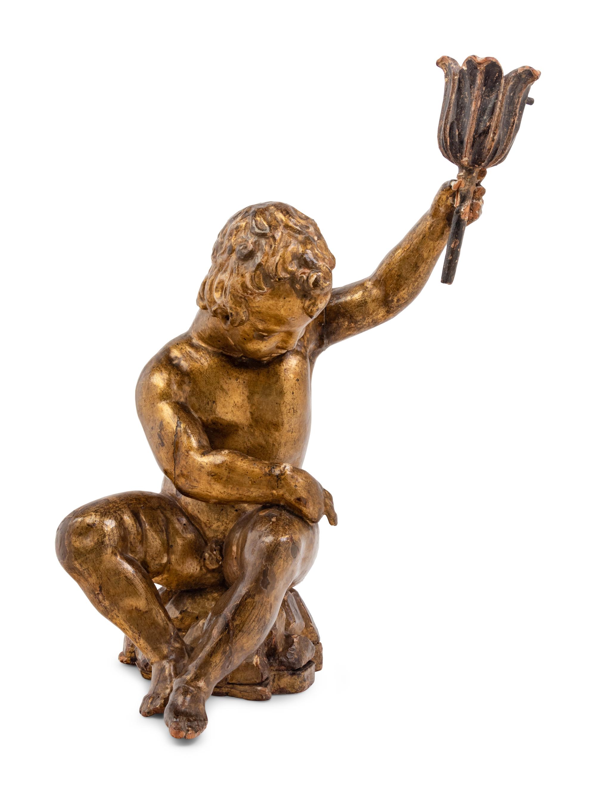 An Italian Giltwood Figural Candle Holder