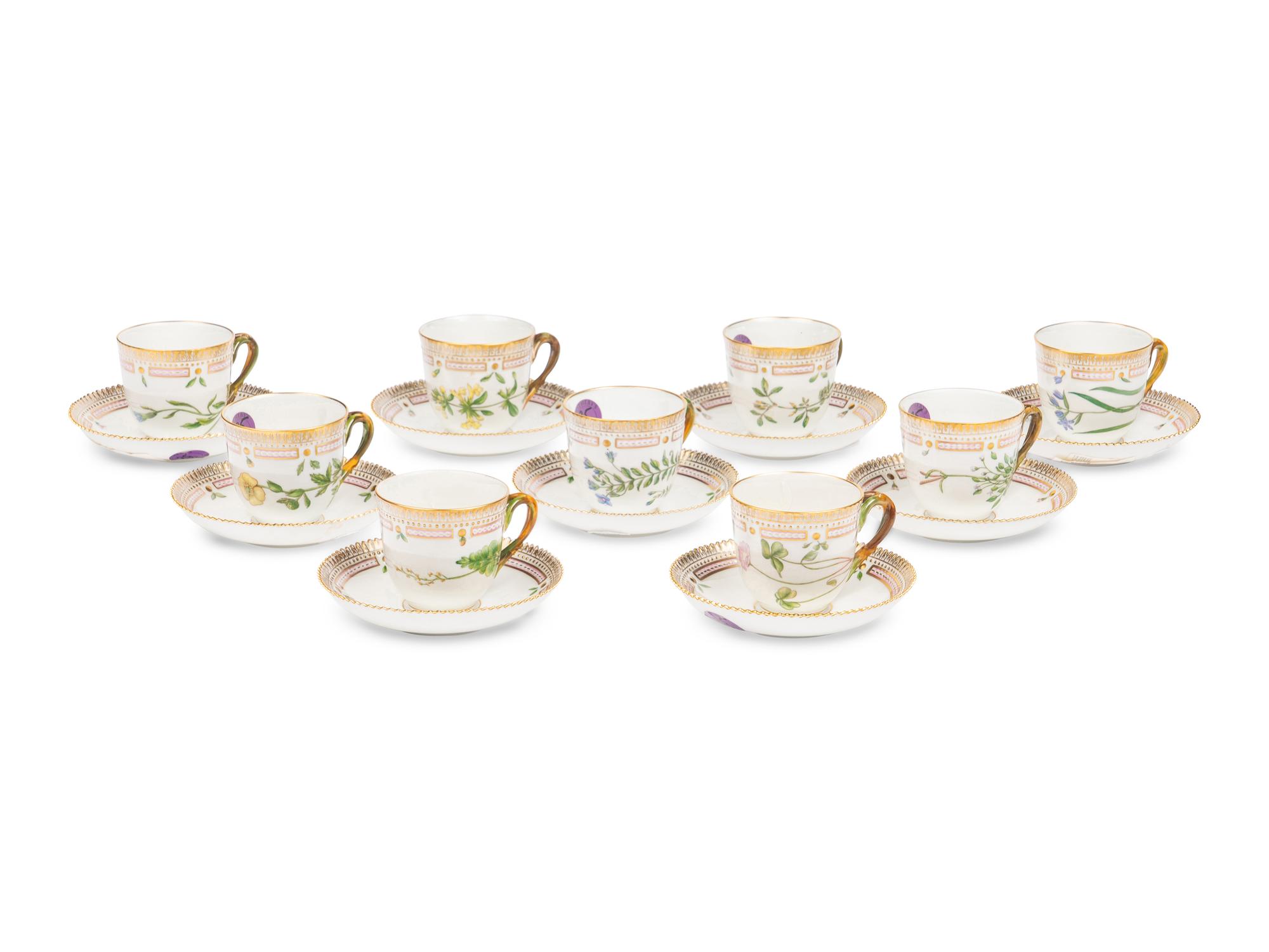 A Set of Nine Royal Copenhagen Flora Danica Porcelain Teacups and Saucers