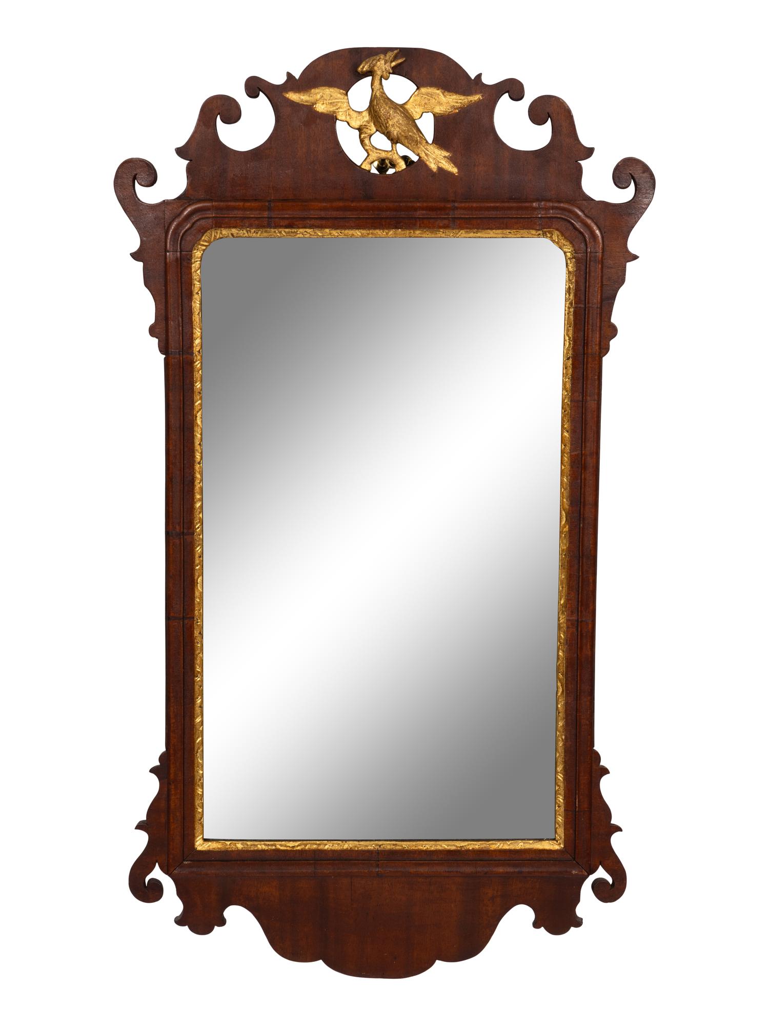 A Chippendale Style Carved and Parcel Gilt Mahogany Looking Glass