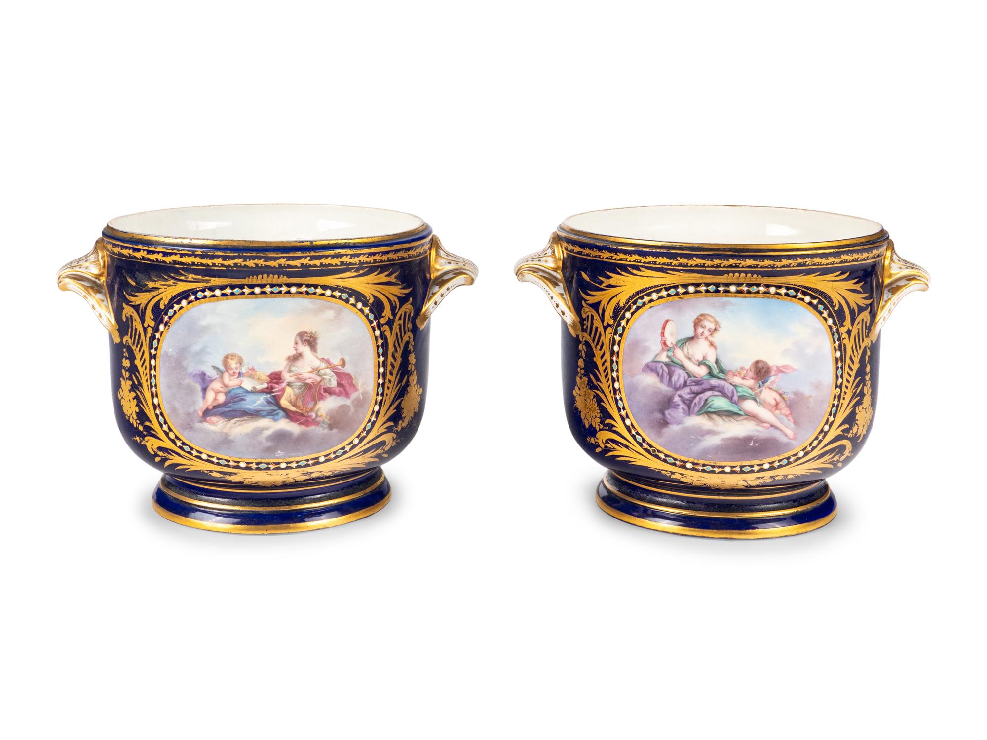 A Pair of Sèvres Style Porcelain Cache Pots