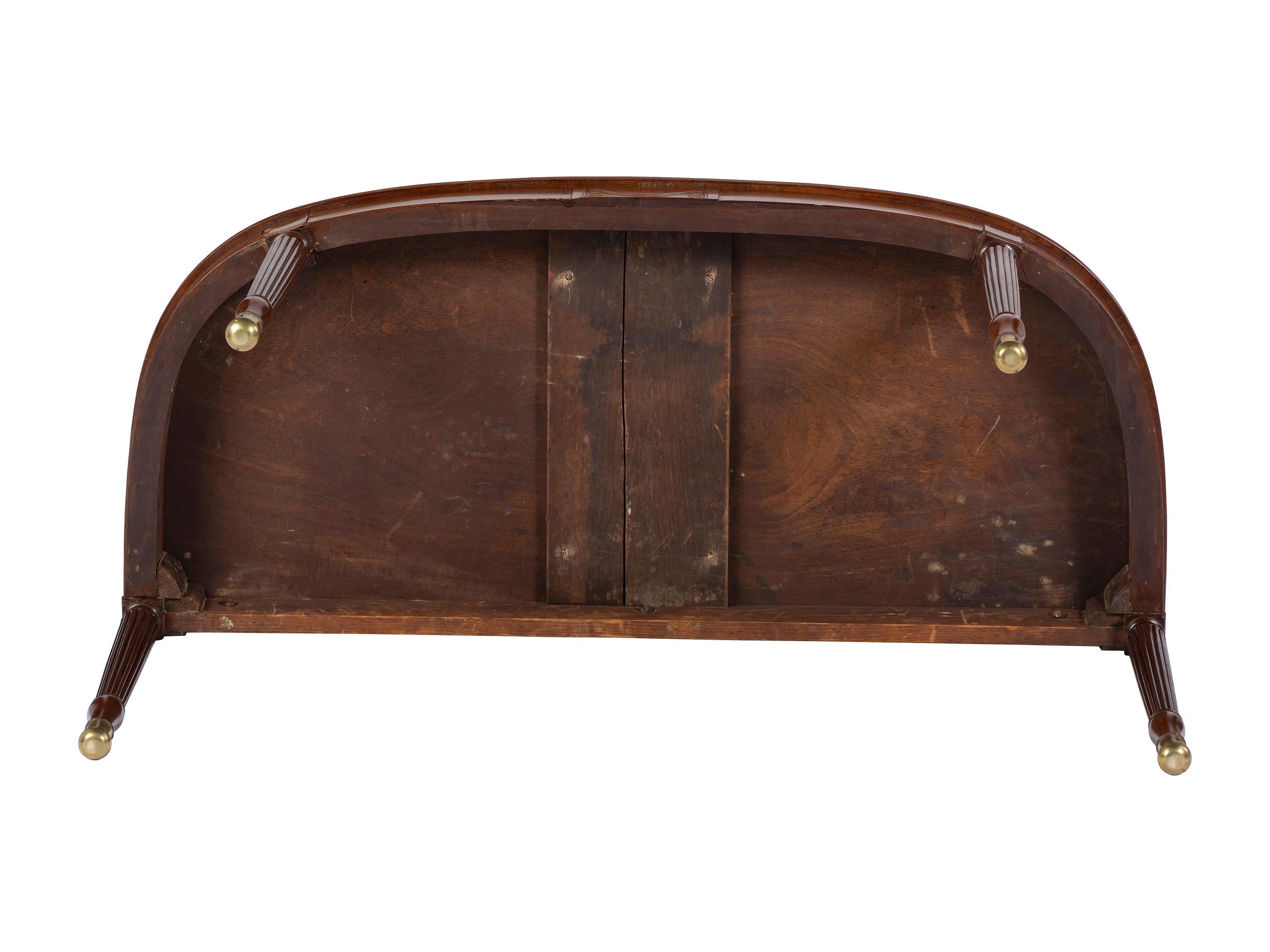 A Pair of Federal Brass-Mounted, Carved and Crossbanded Mahogany Console Tables