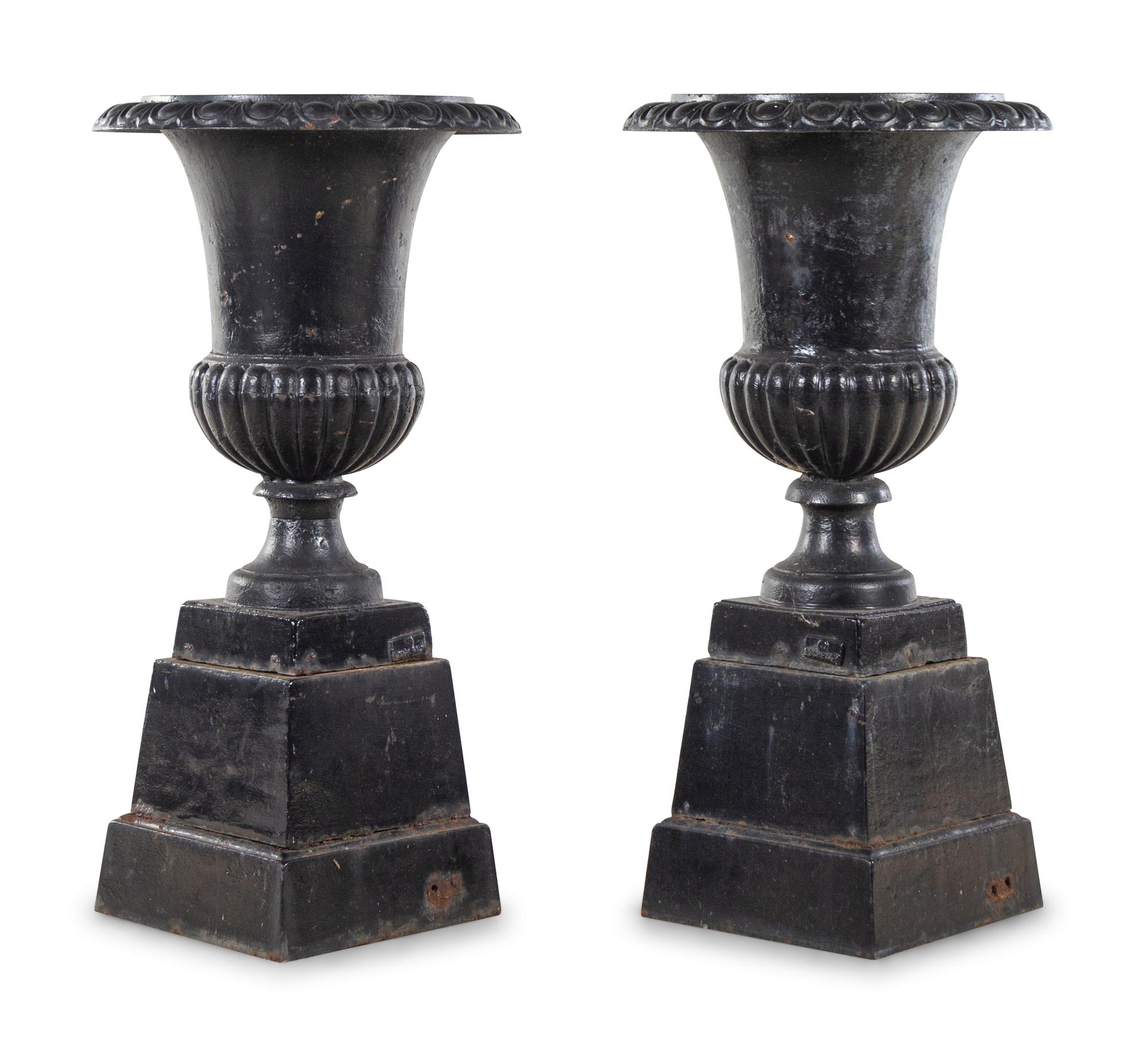 A Pair of German Painted Iron Garden Urns