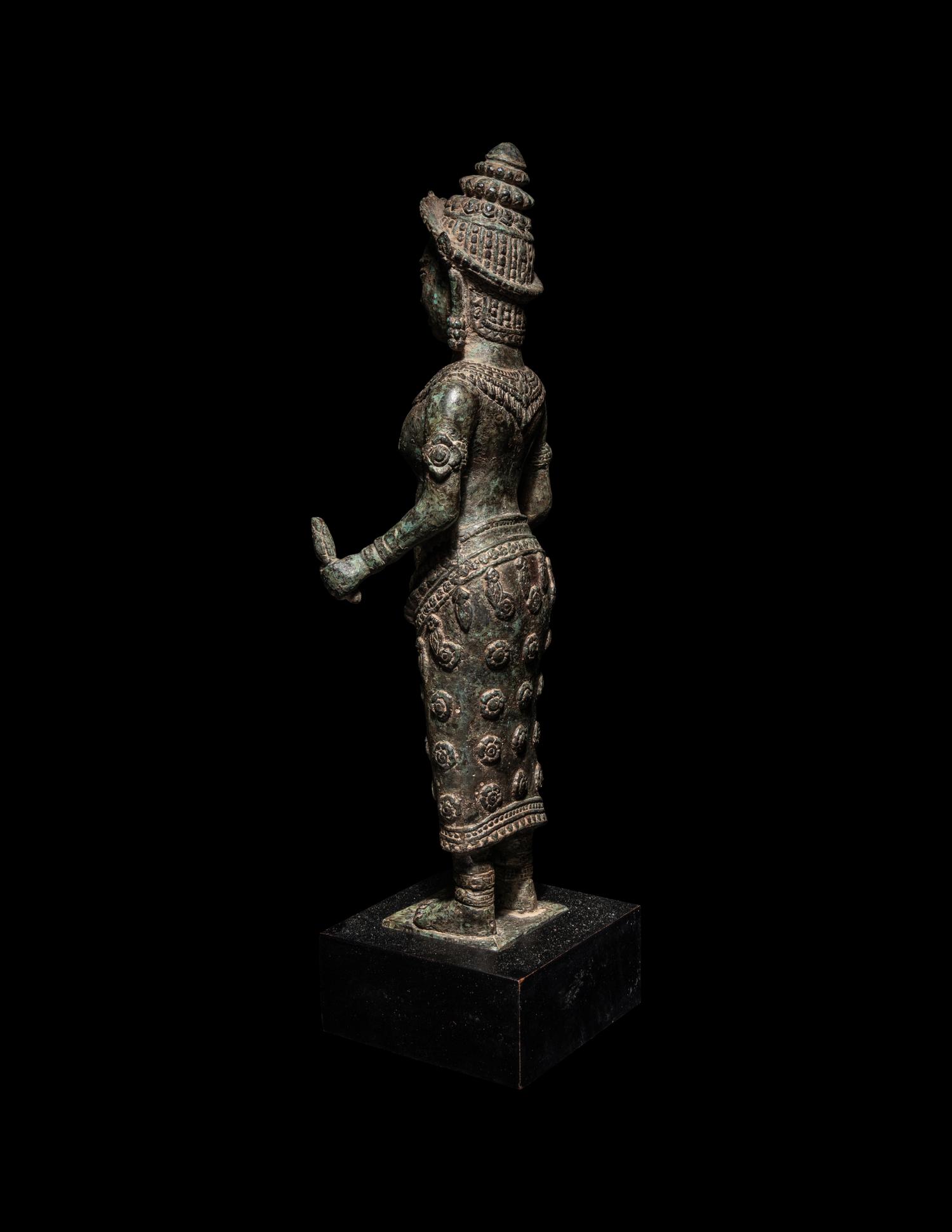 A Khmer Bronze Figure of a Deity
