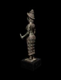 A Khmer Bronze Figure of a Deity