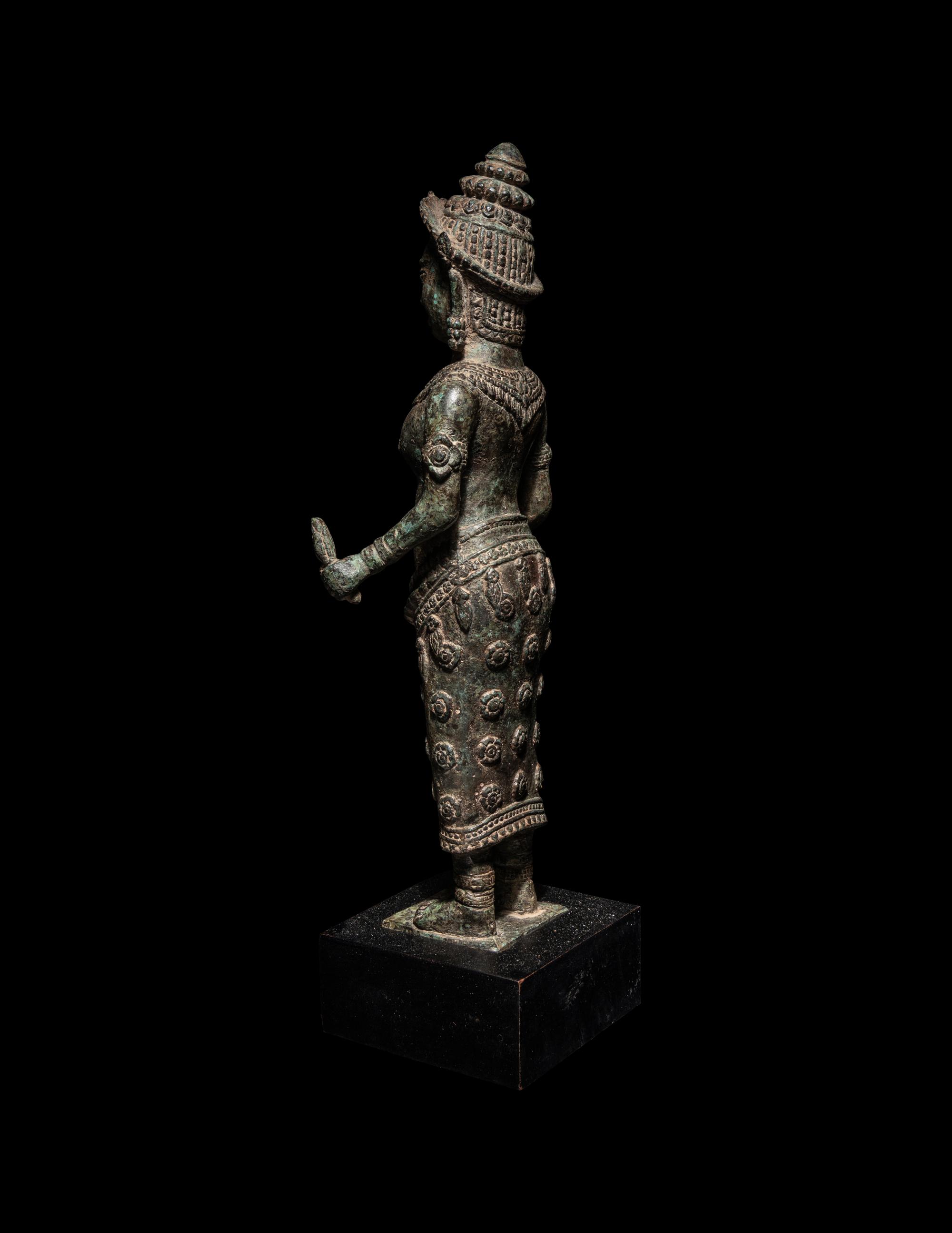 A Khmer Bronze Figure of a Deity