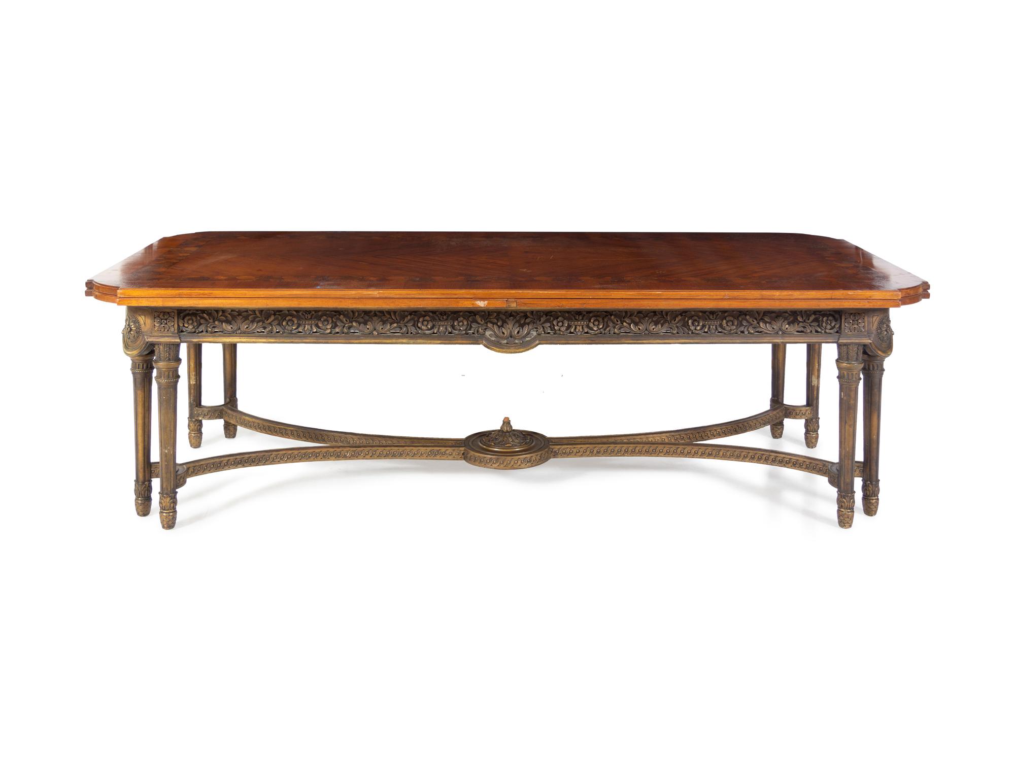 A Louis XVI Style Marquetry Dining Table